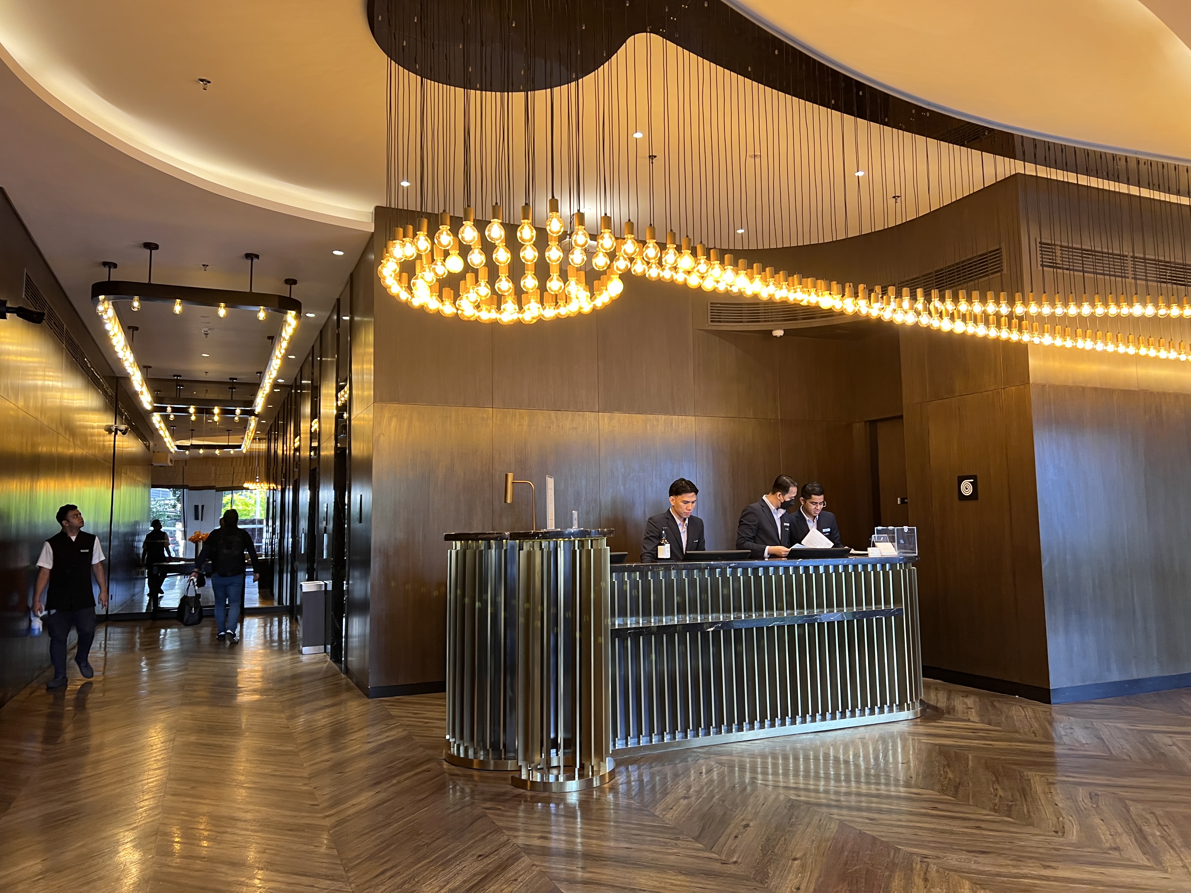 Hotel Stripes Kuala Lumpur Autograph Collection lobby check in desk Hotel Stripes Kuala Lumpur Autograph Collection lobby check in desk