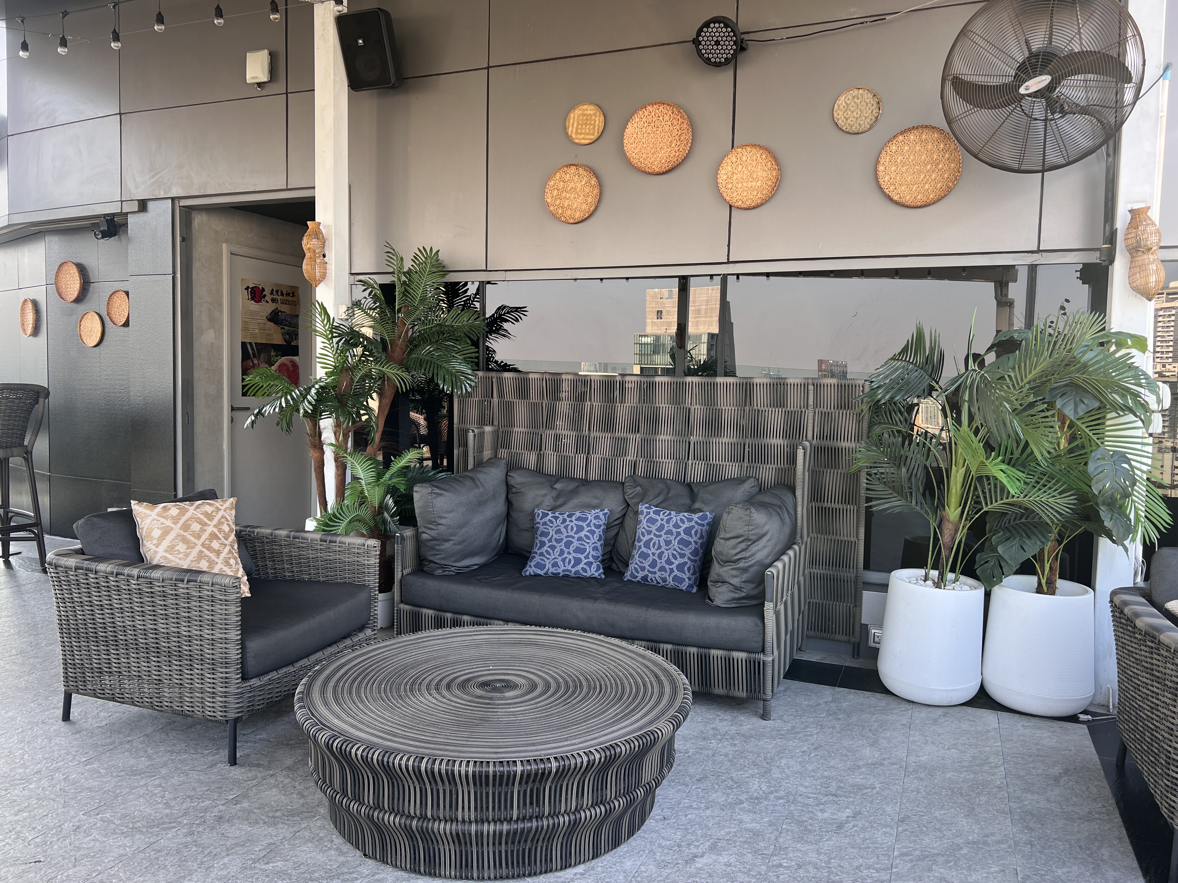 Hyatt Place Bangkok Sukhumvit AIRE Bar outdoor seating area