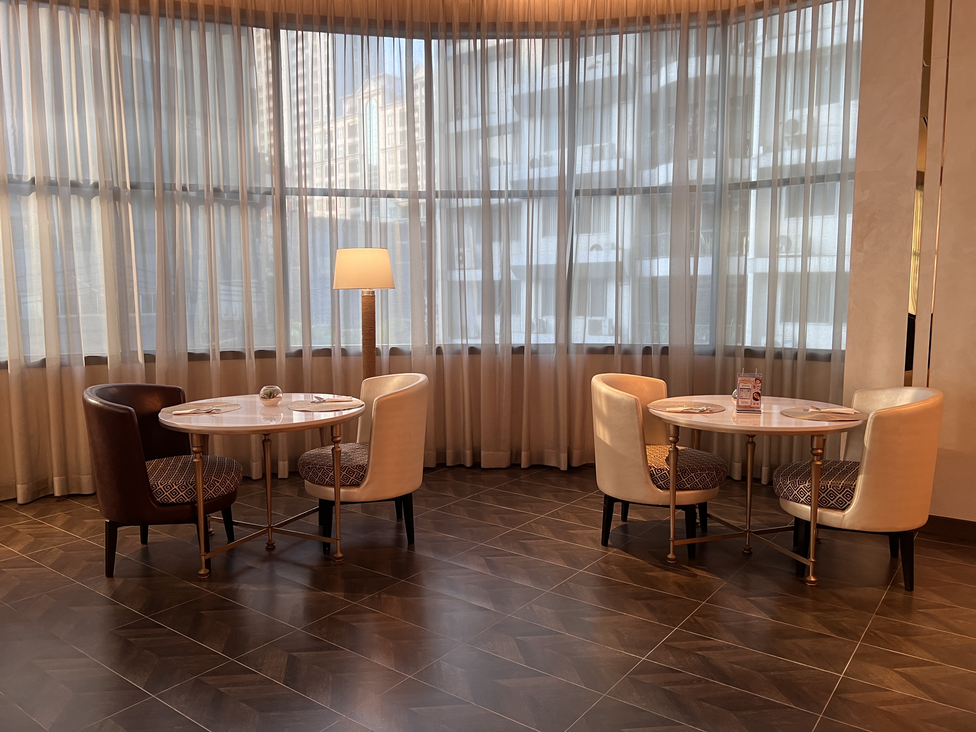 Hyatt Place Bangkok Sukhumvit Gallery Lobby dining tables