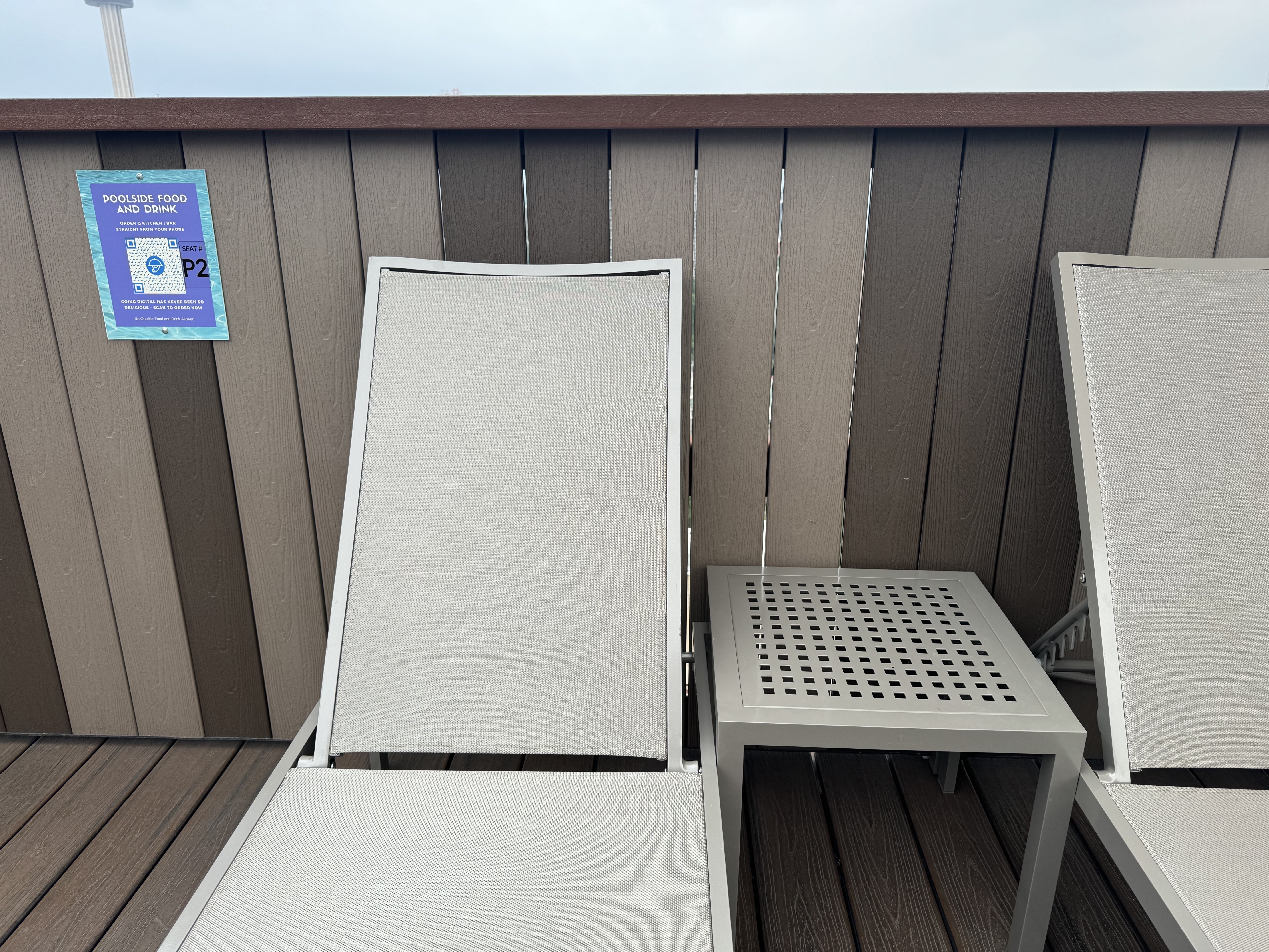 Hyatt Regency San Antonio Riverwalk lounge chairs with QR code for orders Hyatt Regency San Antonio Riverwalk lounge chairs with QR code for orders