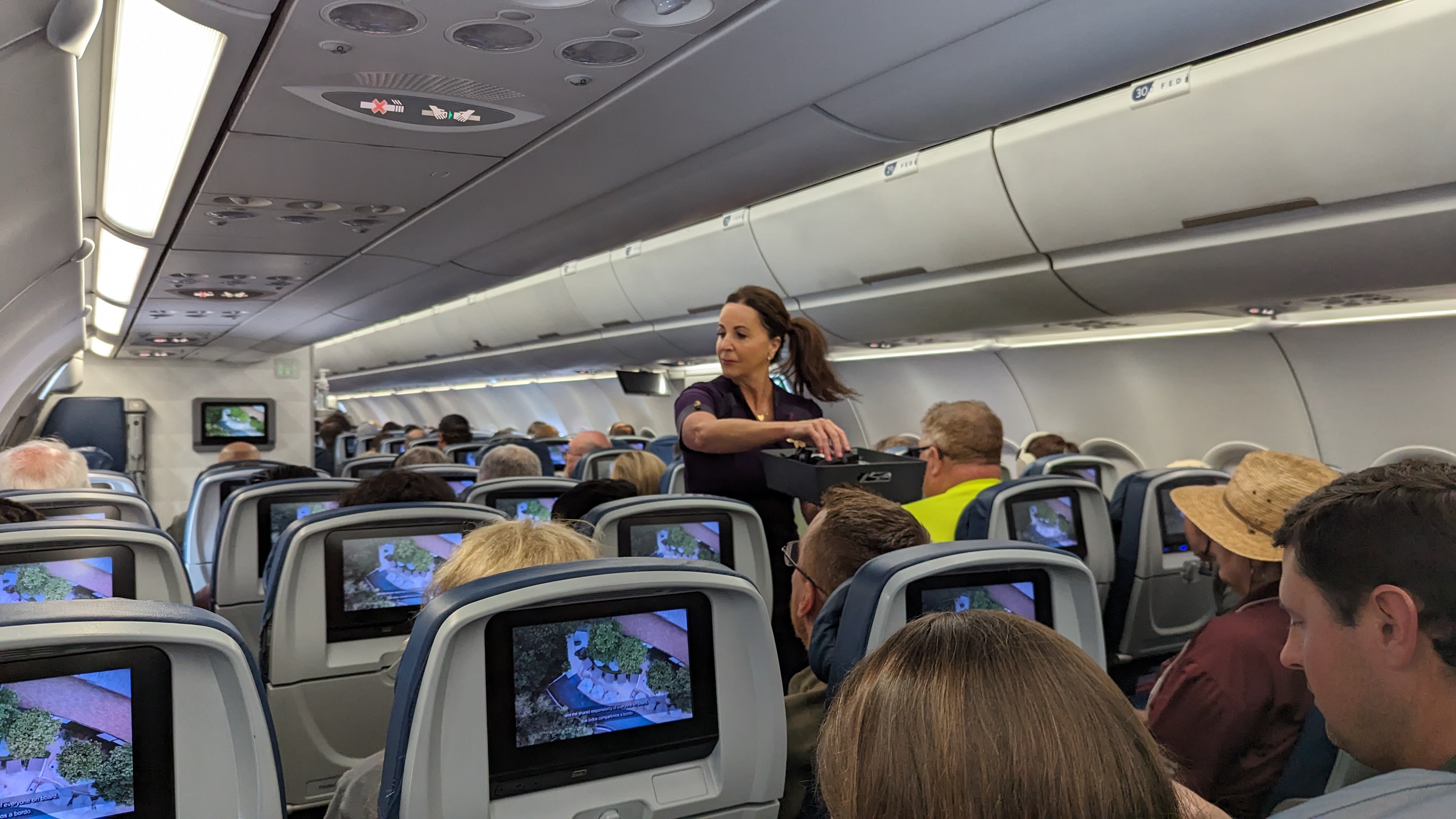 IAH to ATL Delta flight review IFE headphones distribution