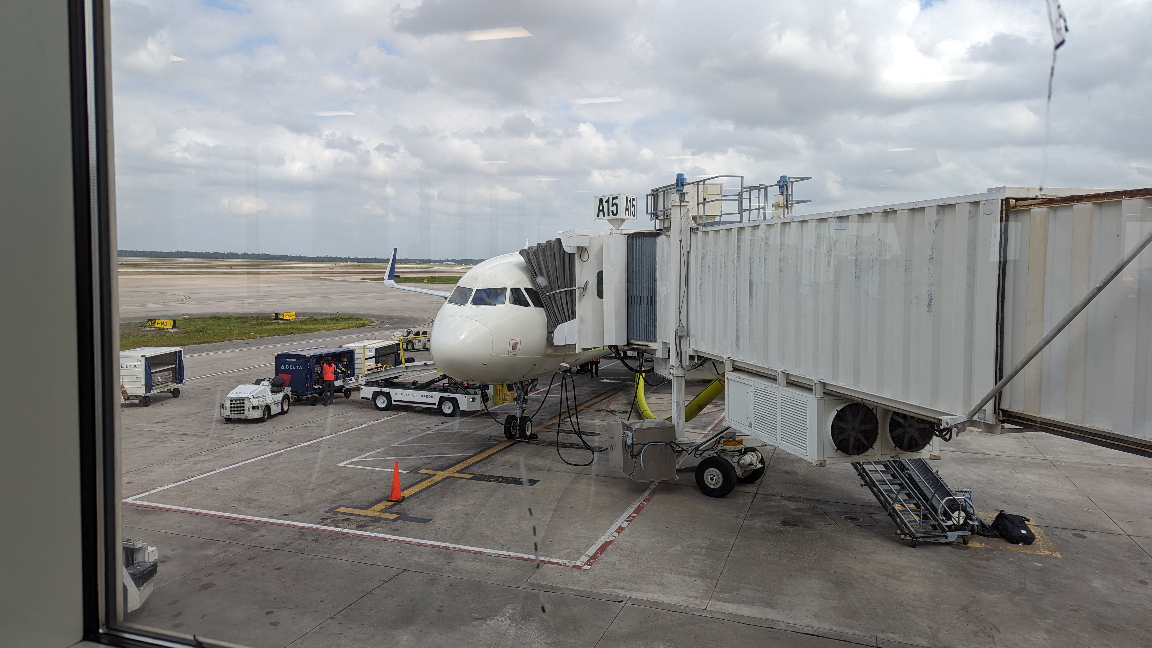IAH to ATL Delta flight review plane before boarding