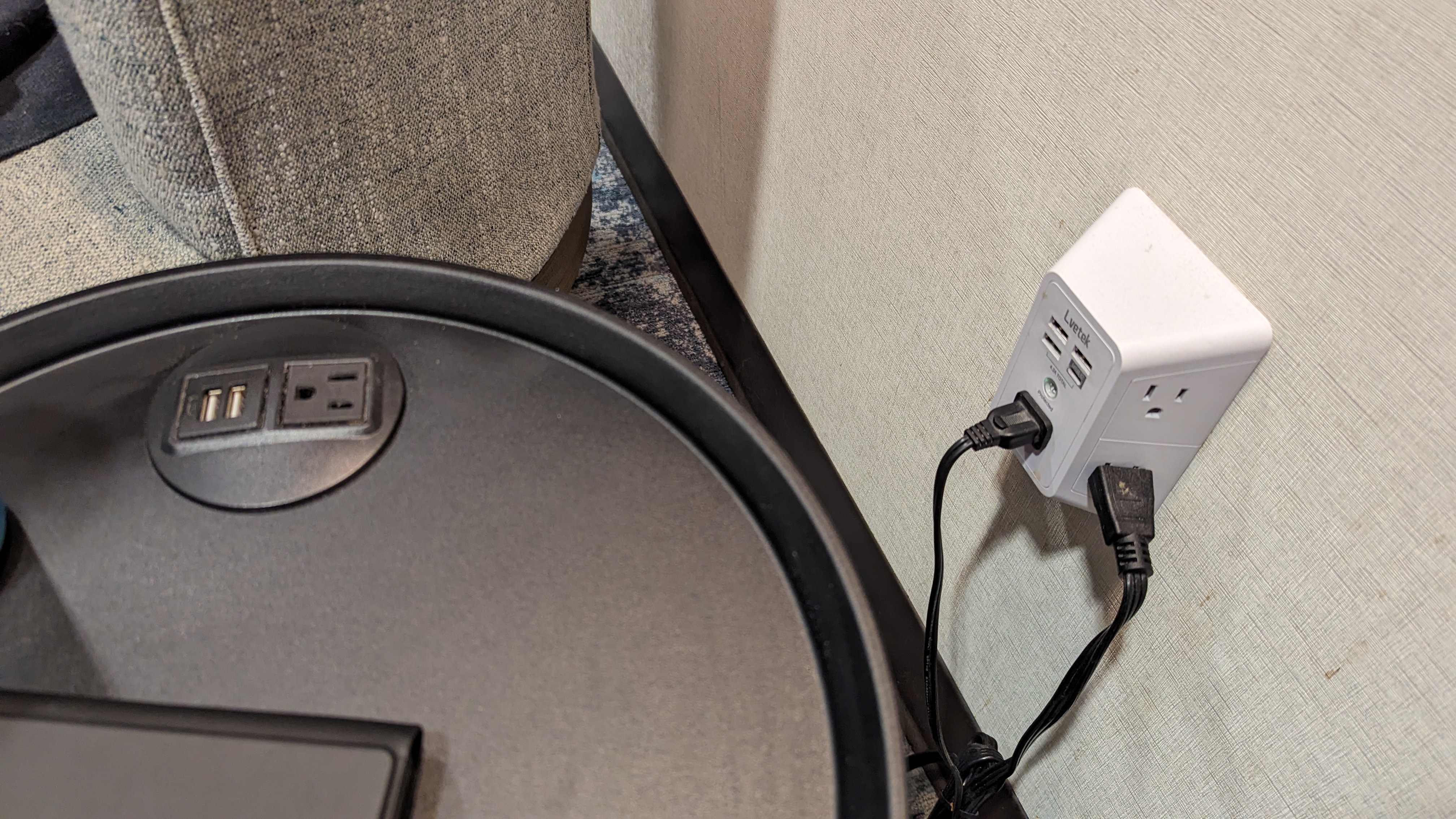 KLM Crown Lounge IAH seating table plugs