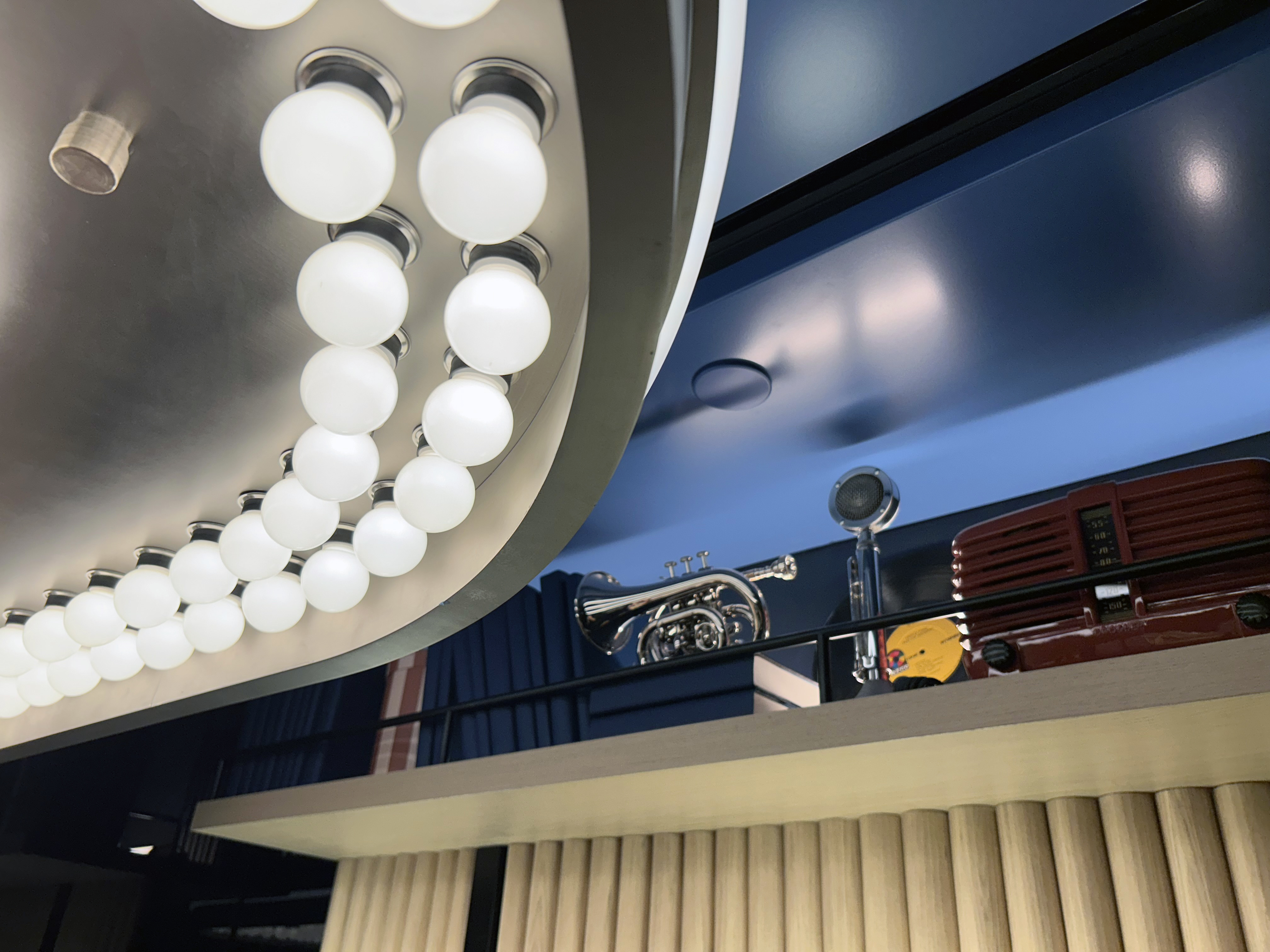 LGA Sapphire Lounge game room shelf trumpet details