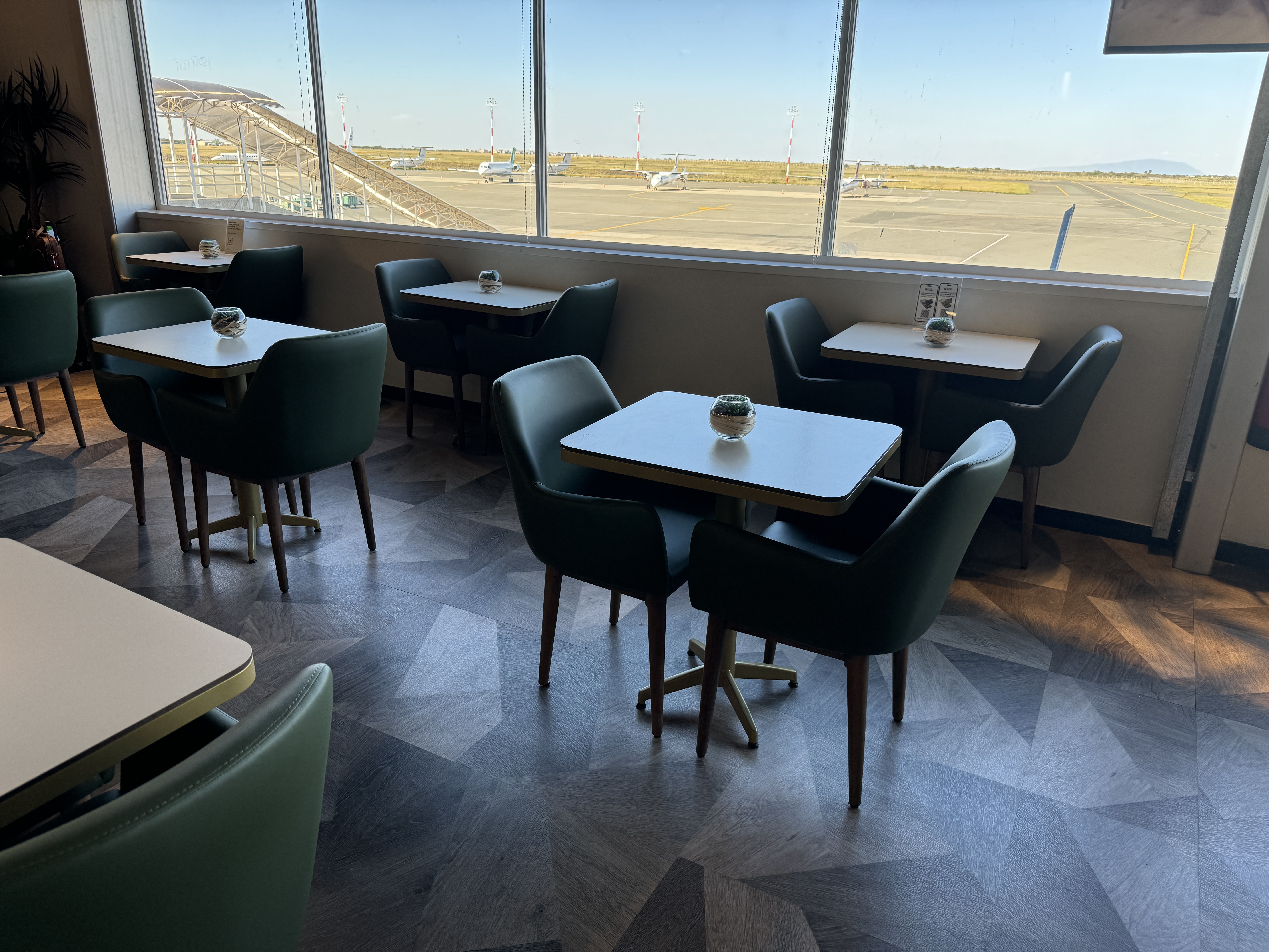 Plaza Premium Lounge NBO dining tables