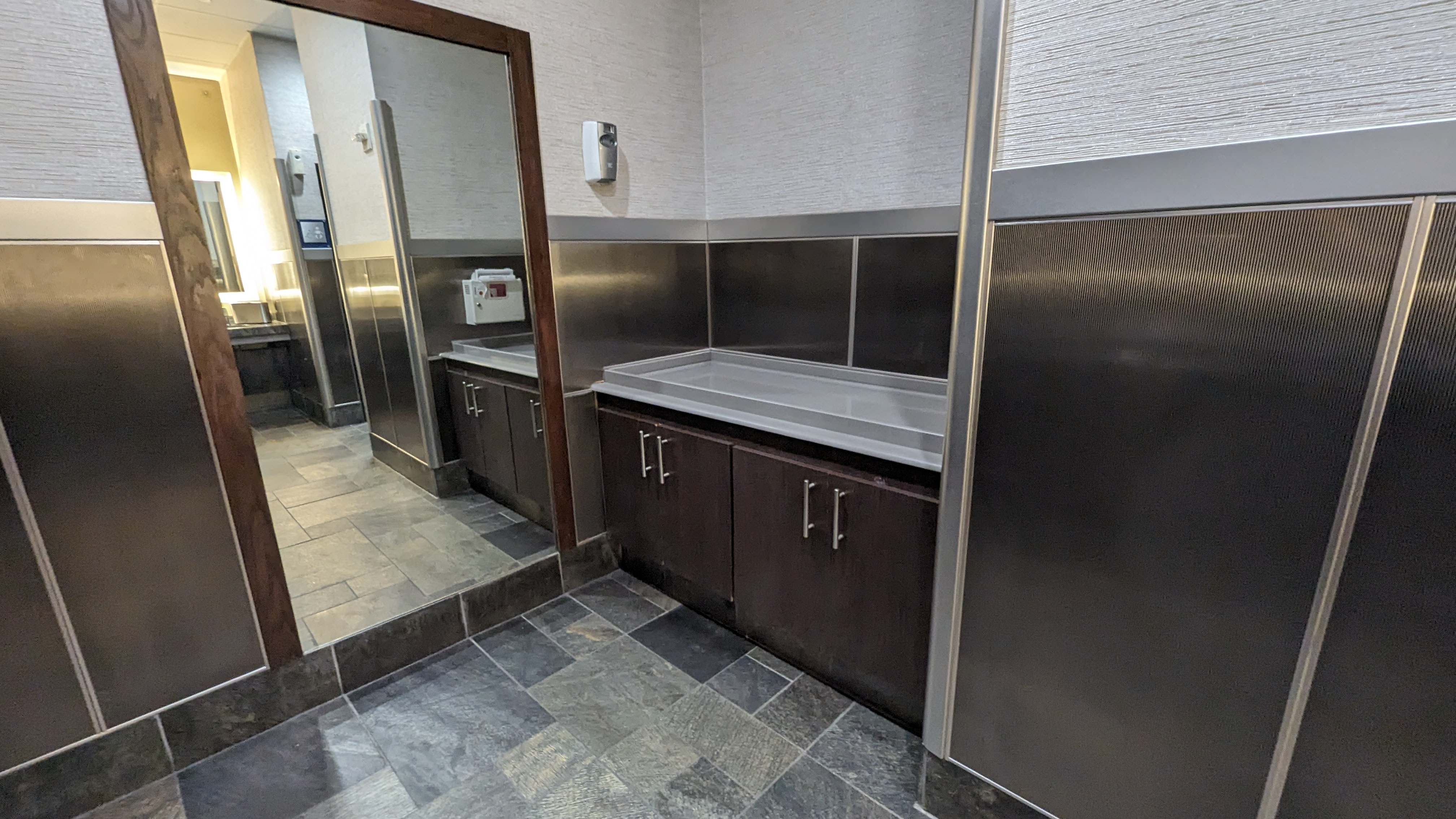 Concourse C Delta Sky Club at Hartsfield Jackson Atlanta International Airport changing table and mirror