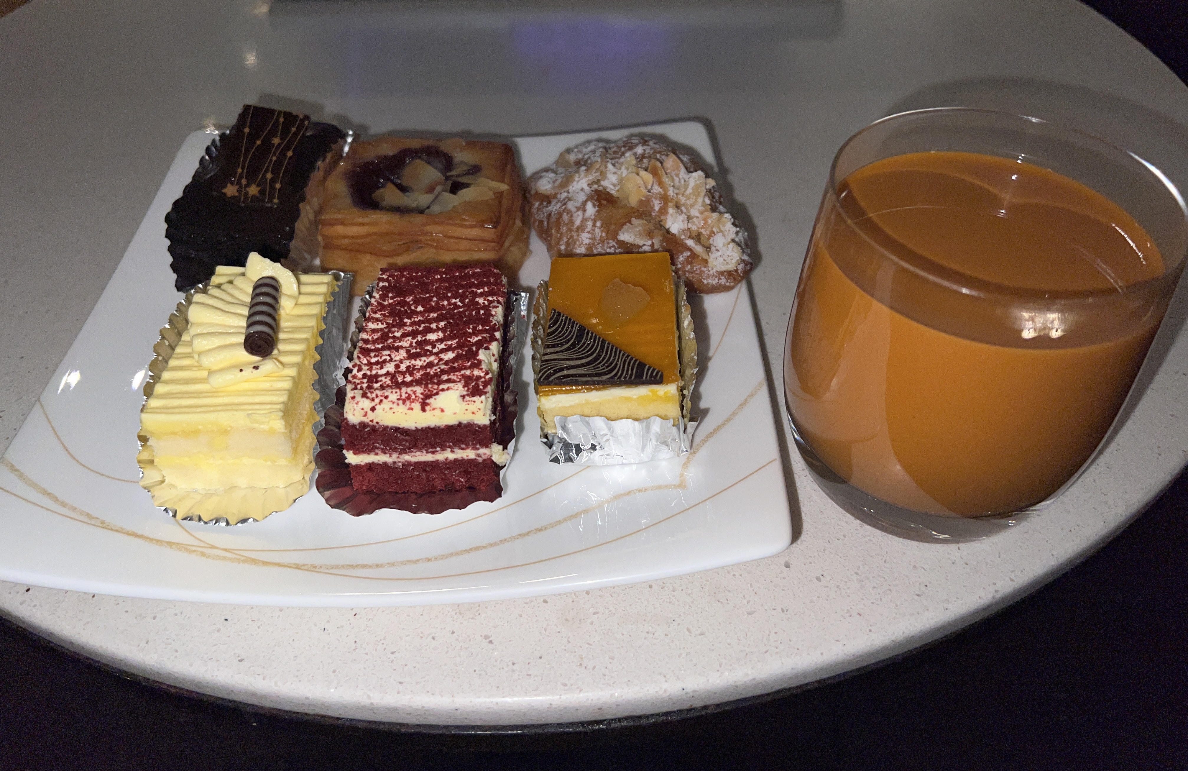 Thai Airways Royal Silk Lounge pastries plate Thai Airways Royal Silk Lounge pastries plate