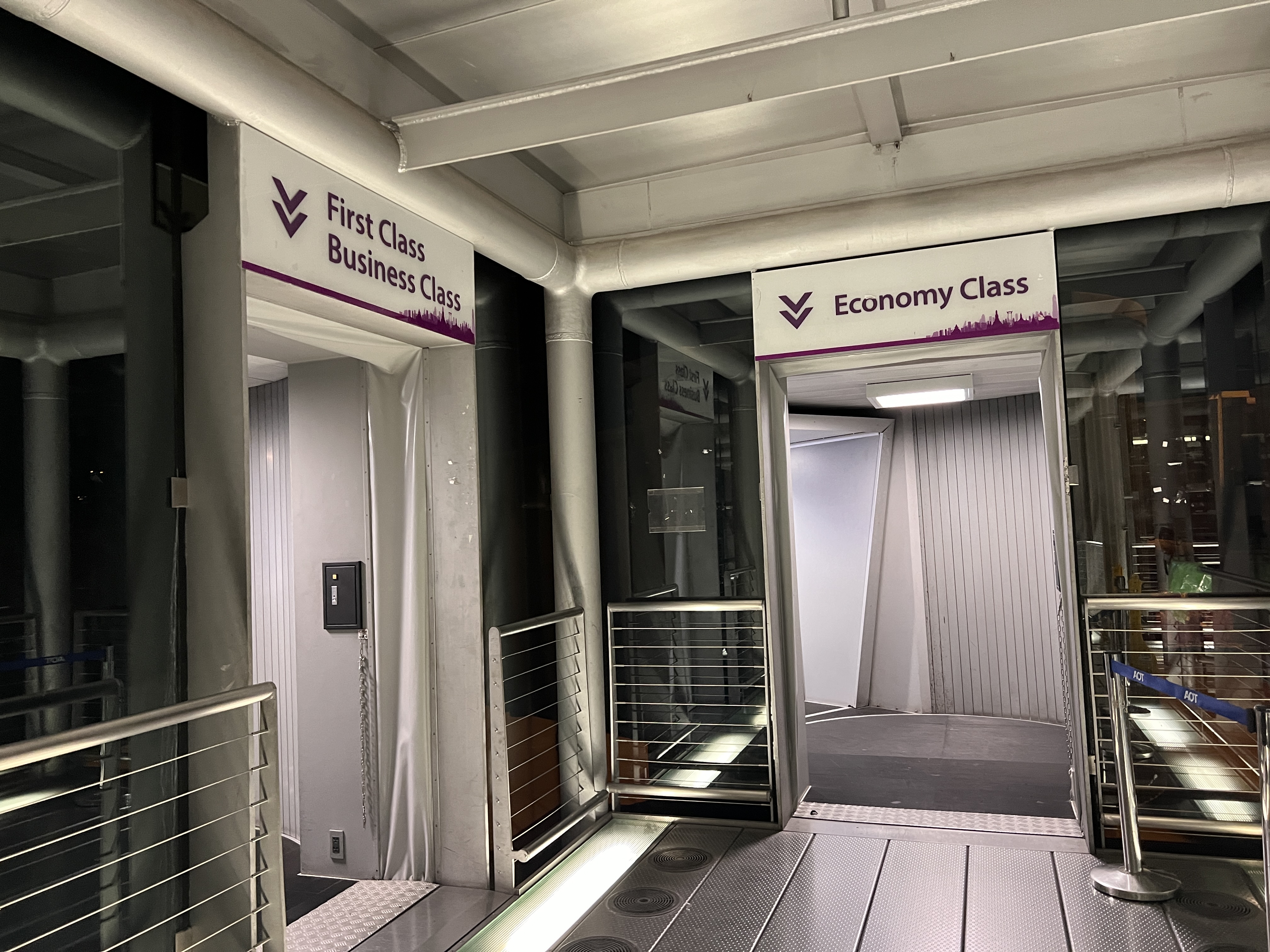 Thai Airways Royal Silk separate doors for flight Thai Airways Royal Silk separate doors for flight