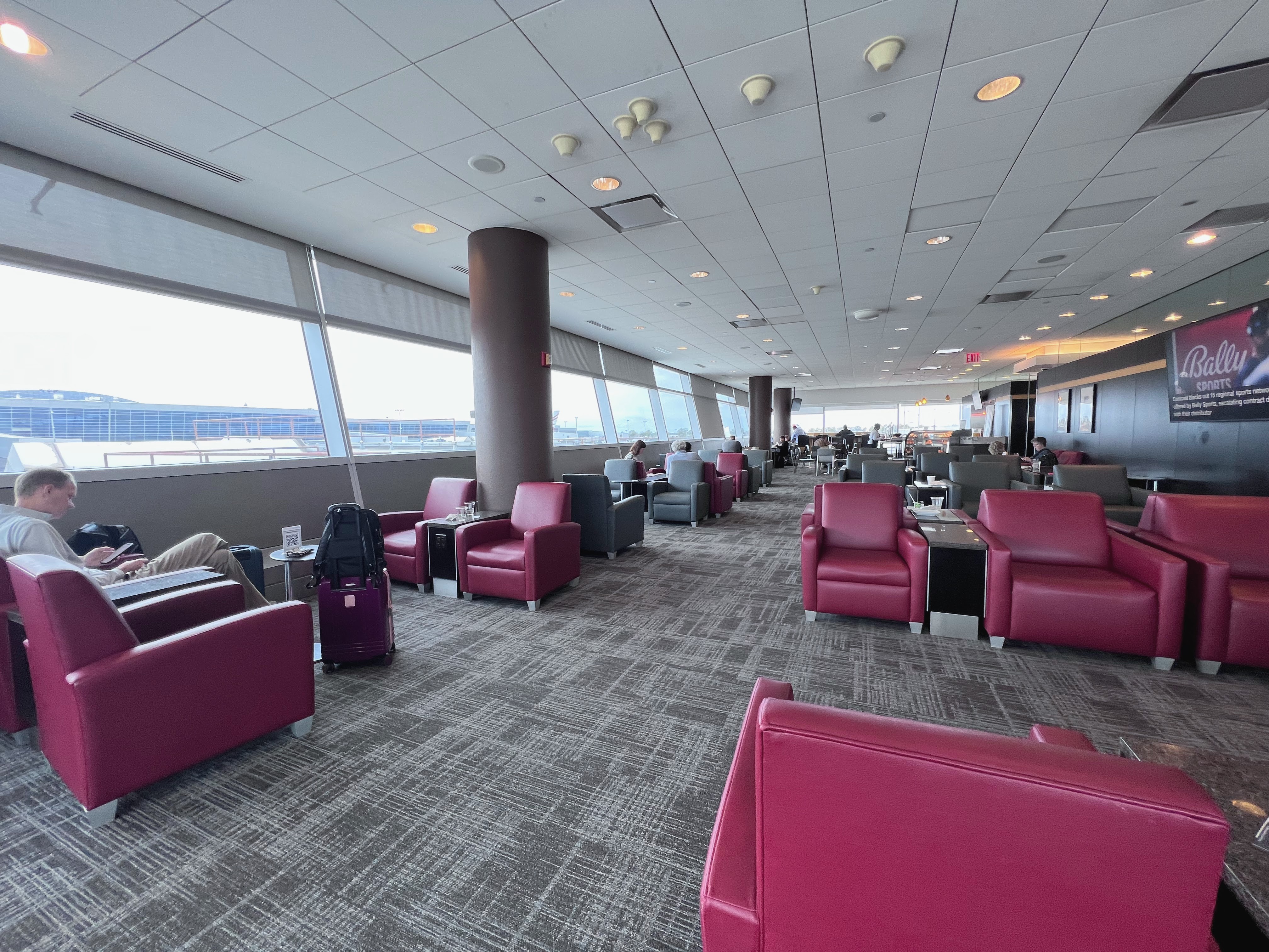 American Airlines Admirals Club at Orlando MCO bar stools Admirals Club JFK Terminal 8