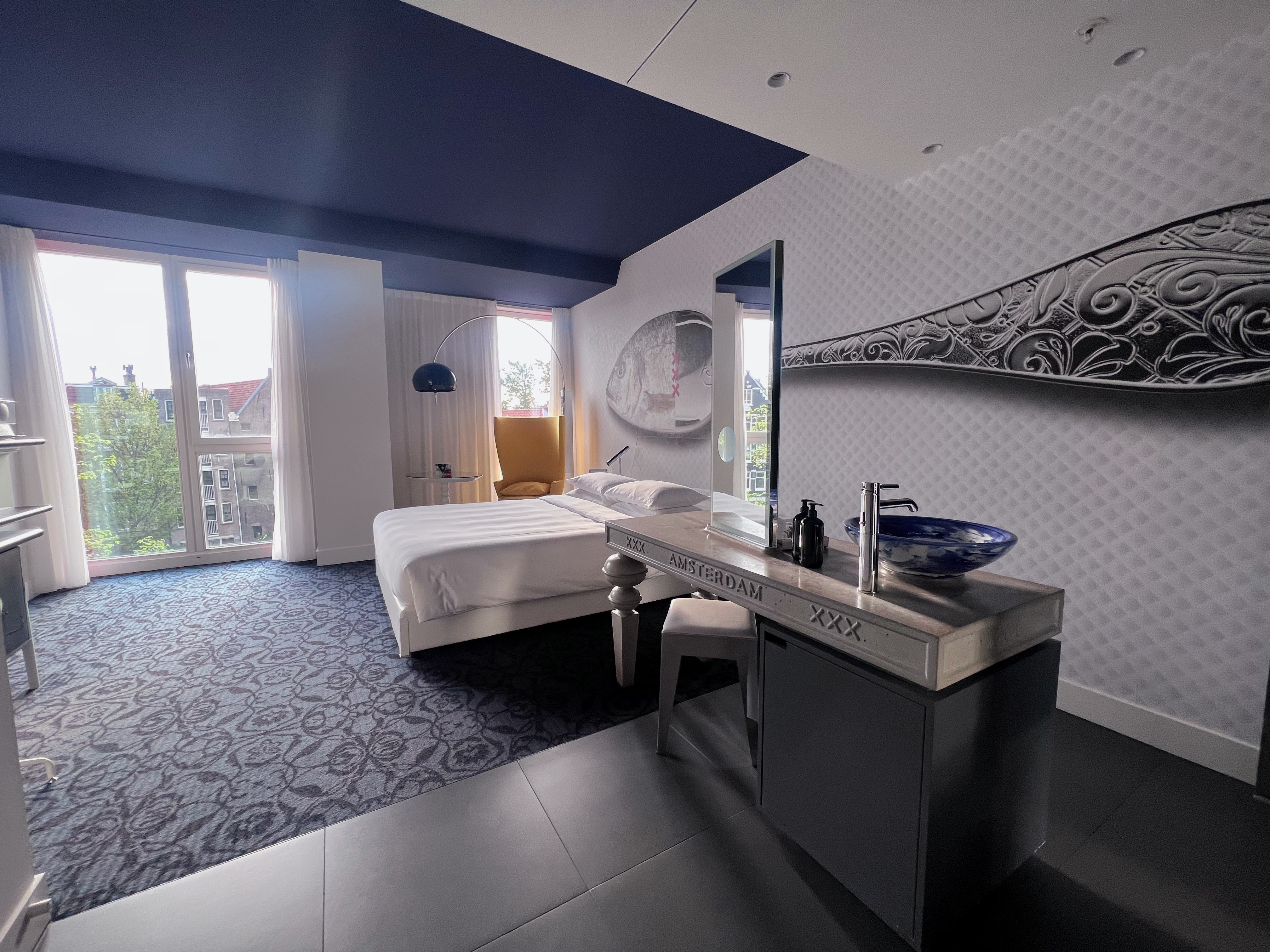 Andaz Amsterdam queen bed with canal view Andaz Amsterdam queen bed with canal view