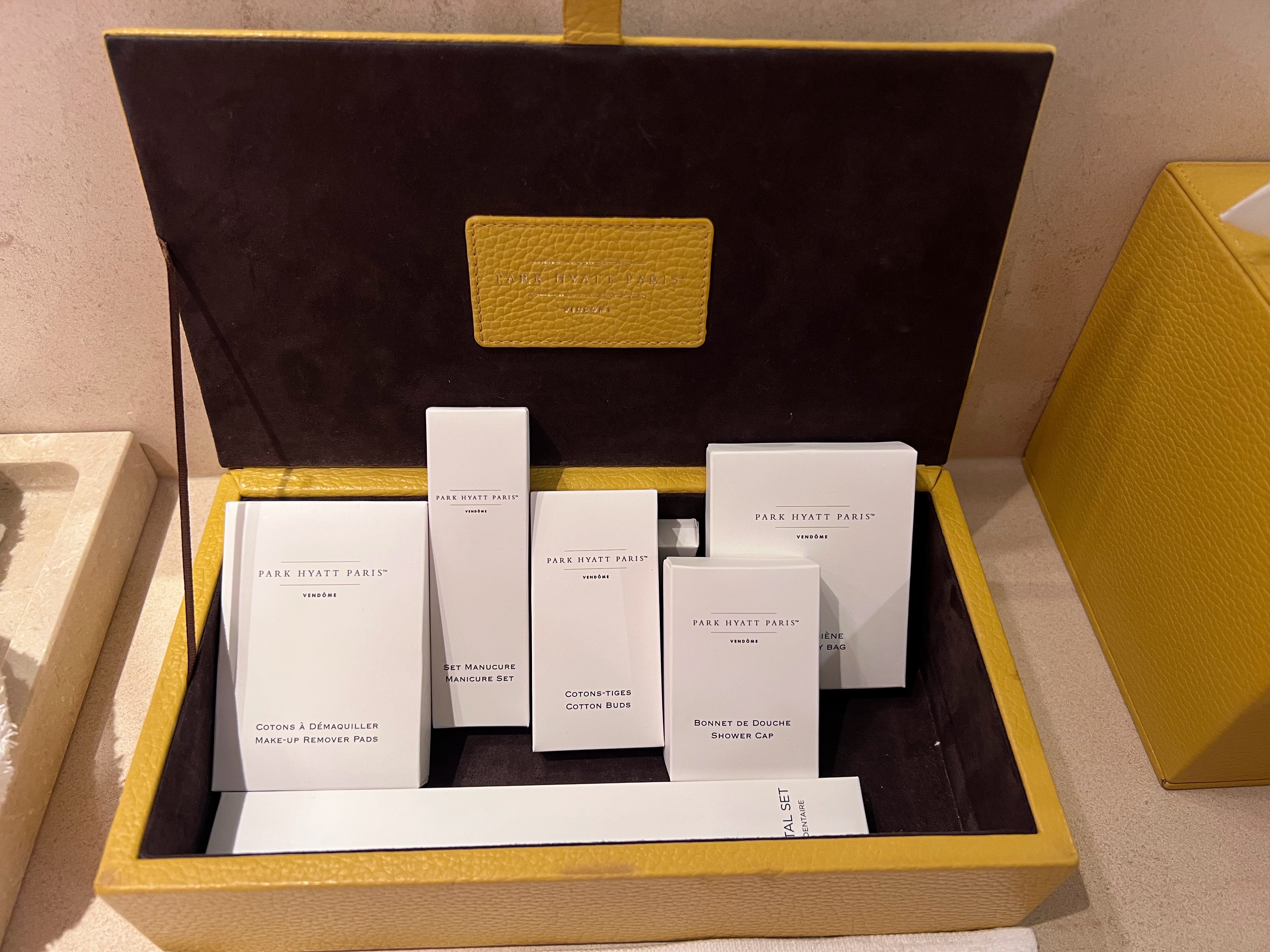 Bath amenities by sink at Park Hyatt Paris Bathroom counter toiletries at Park Hyatt Paris