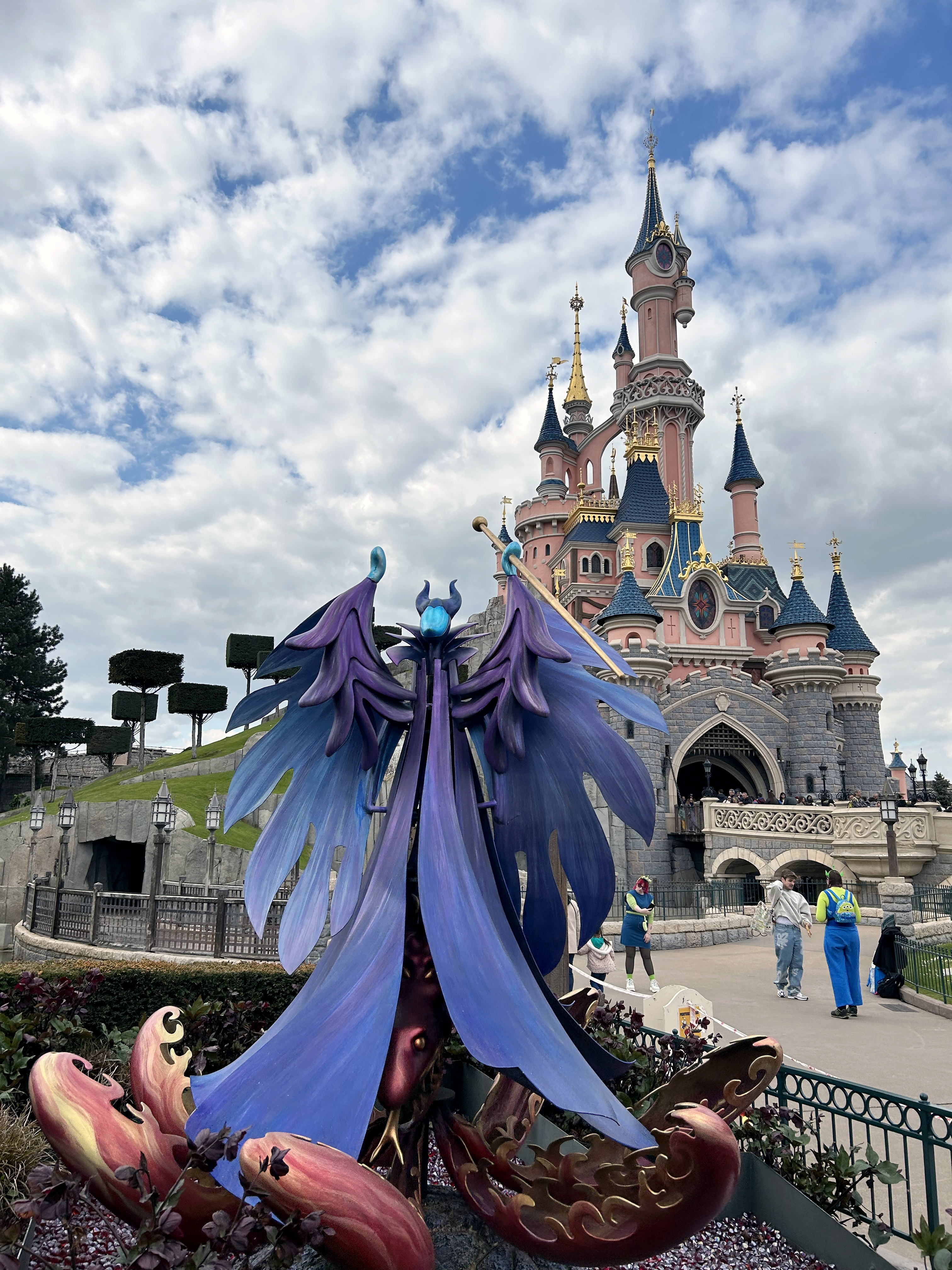 Disneyland Paris castle Maleficent statue Disneyland Paris castle Maleficent statue