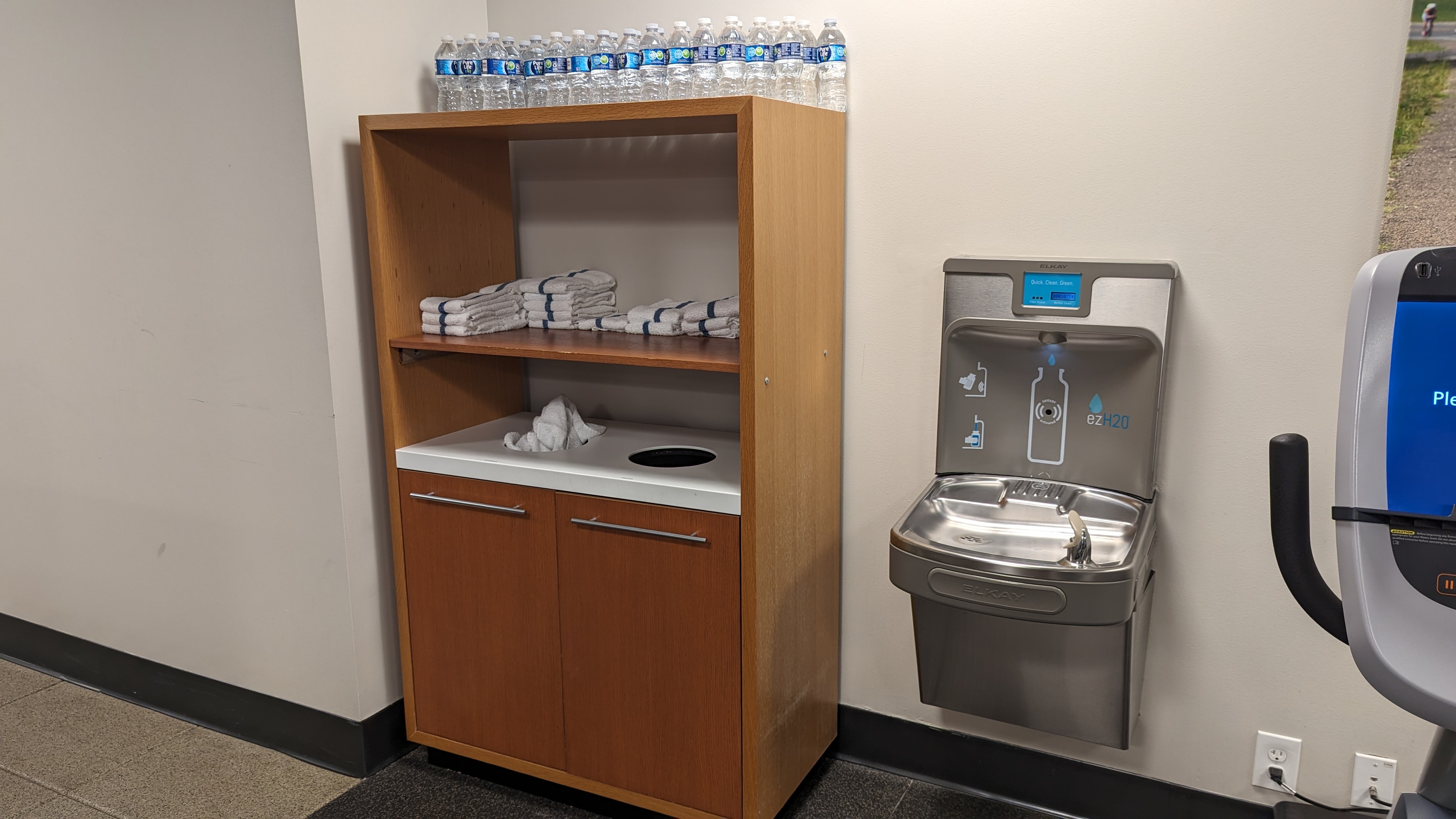 Embassy Suites by Hilton The Woodlands at Hughes Landing amenities fitness center towels and water
