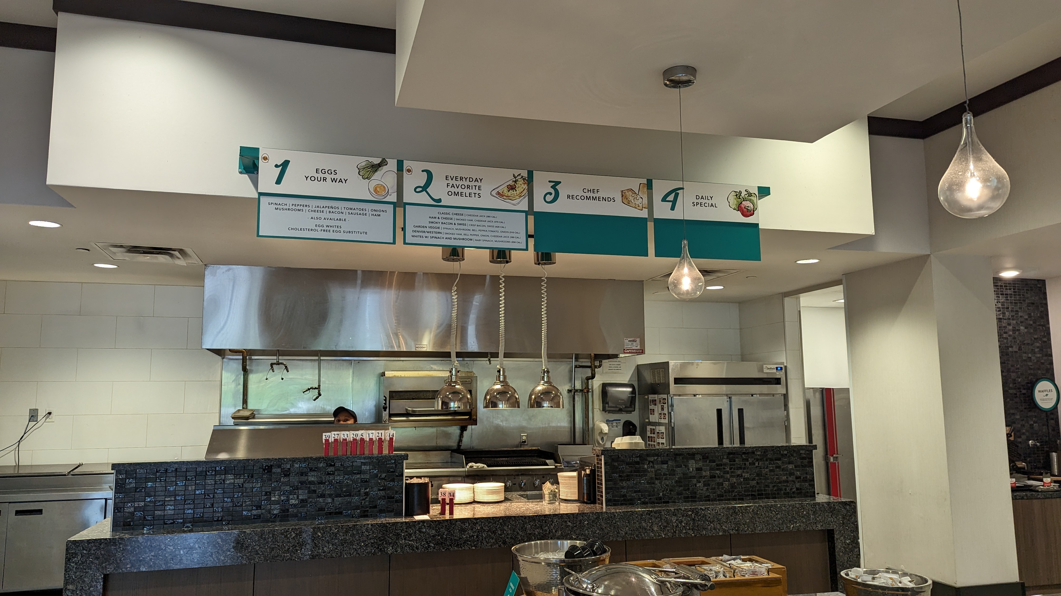 Embassy Suites by Hilton The Woodlands at Hughes Landing food and beverage breakfast buffet omelet station