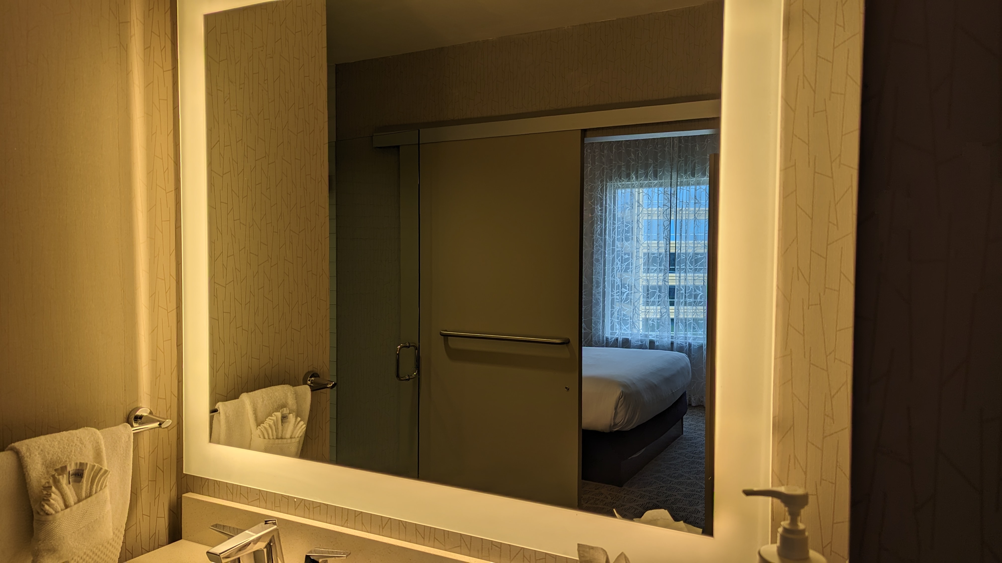 Embassy Suites by Hilton The Woodlands at Hughes Landing room bathroom lit mirror