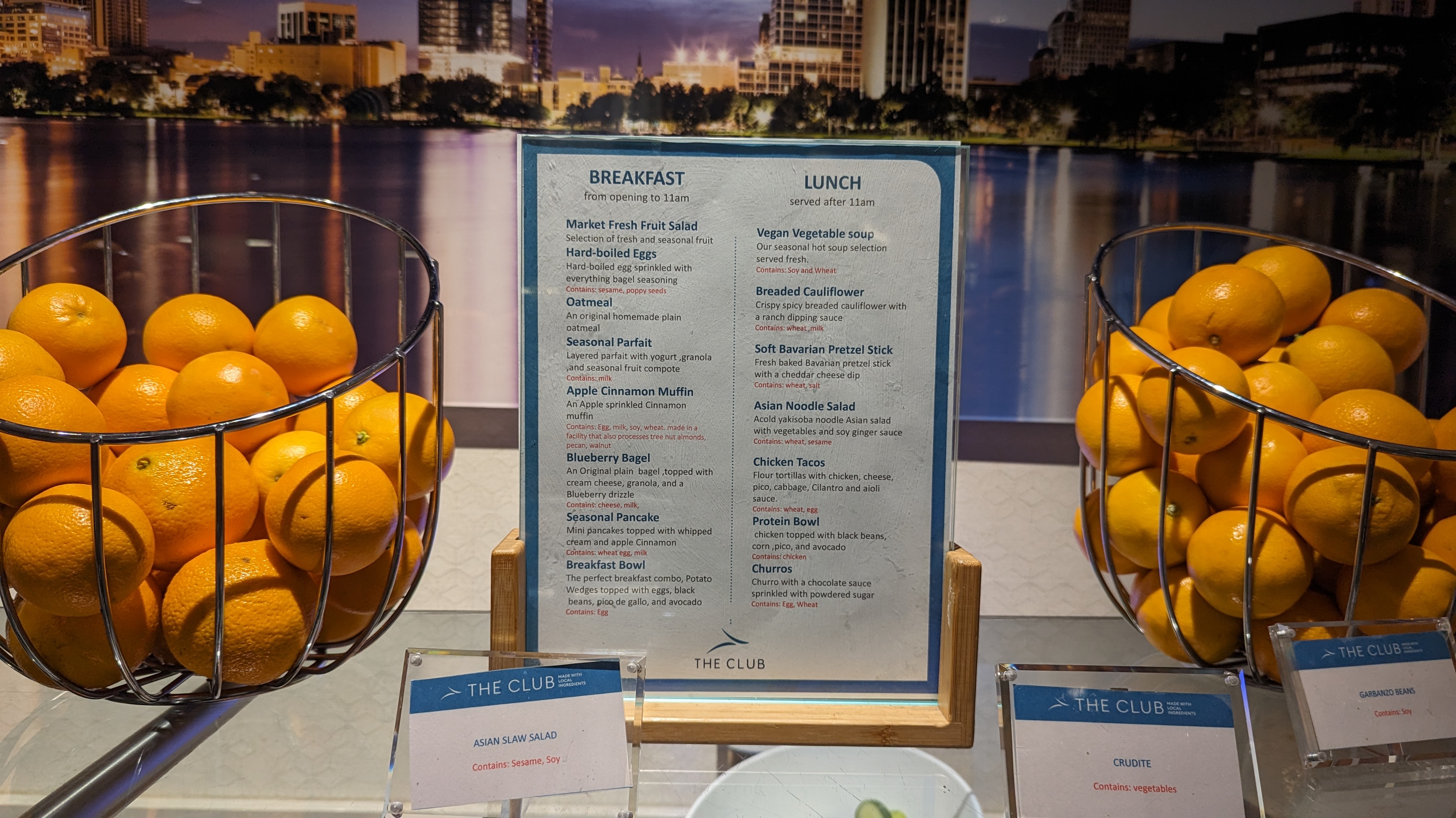 MCO Terminal B The Club MCO Gates 70 99 buffet fruit and hot menu