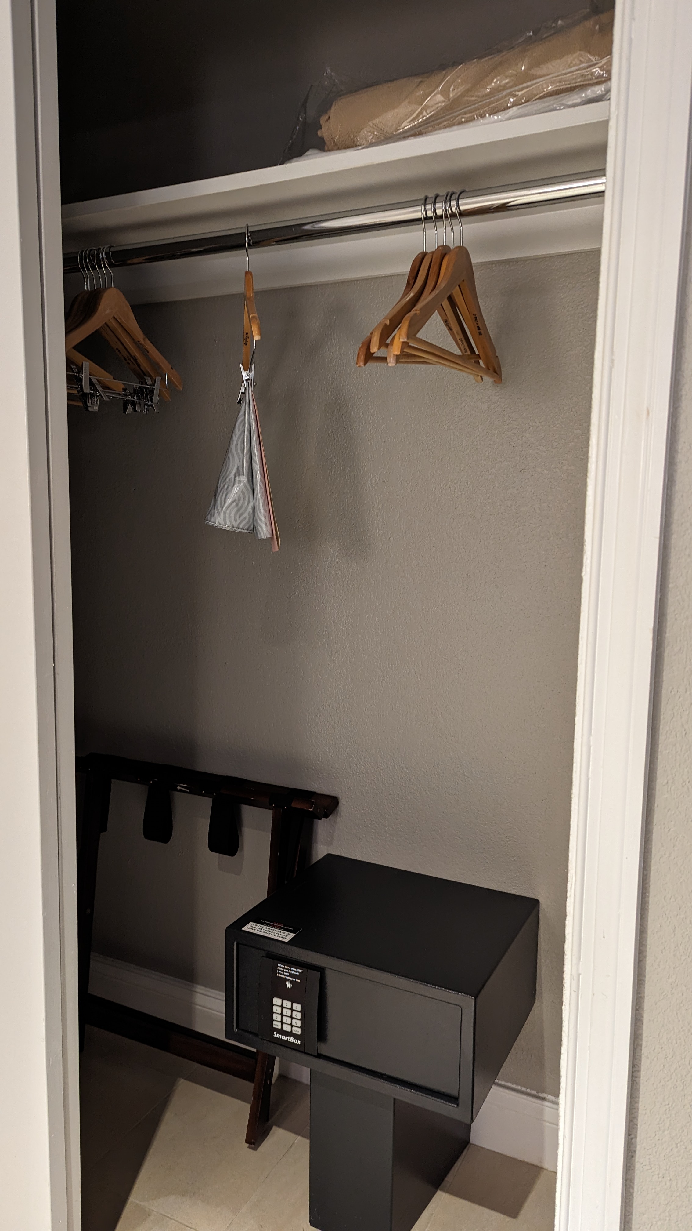Orlando World Center Marriott 2 Queen Ambassador Suite living room closet with safe Orlando World Center Marriott 2 Queen Ambassador Suite living room closet with safe