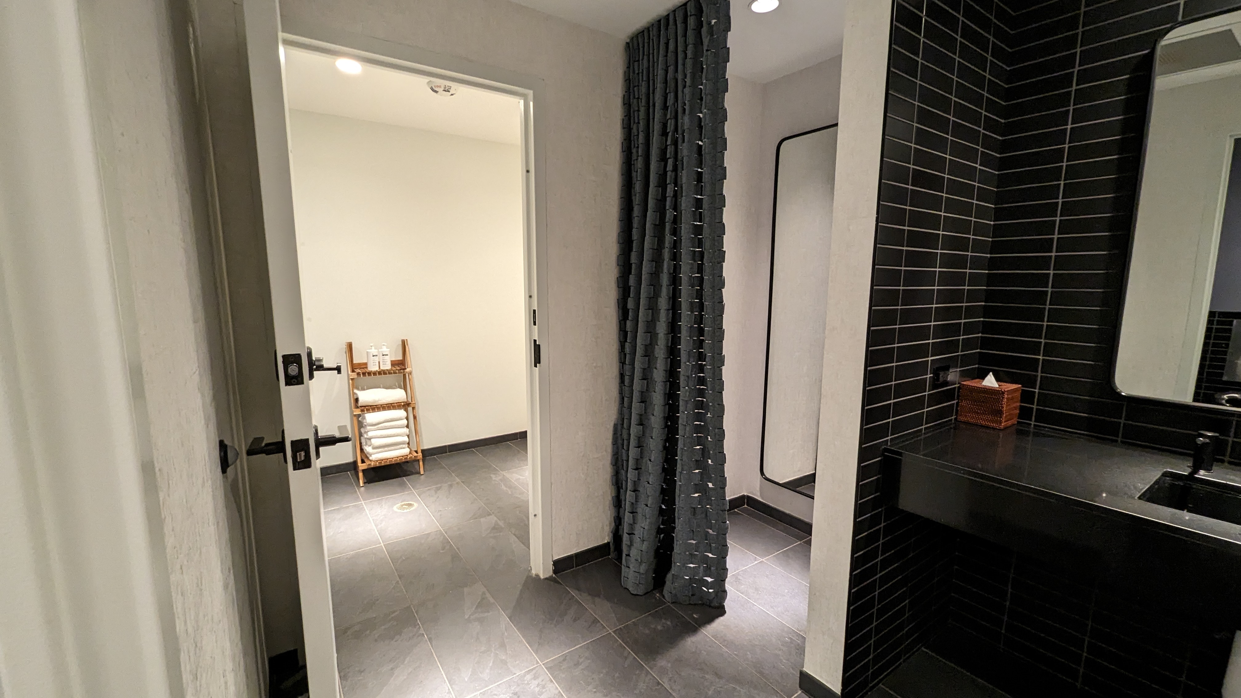Thompson Austin amenities fitness center bathroom with shower and changing Thompson Austin amenities fitness center bathroom with shower and changing