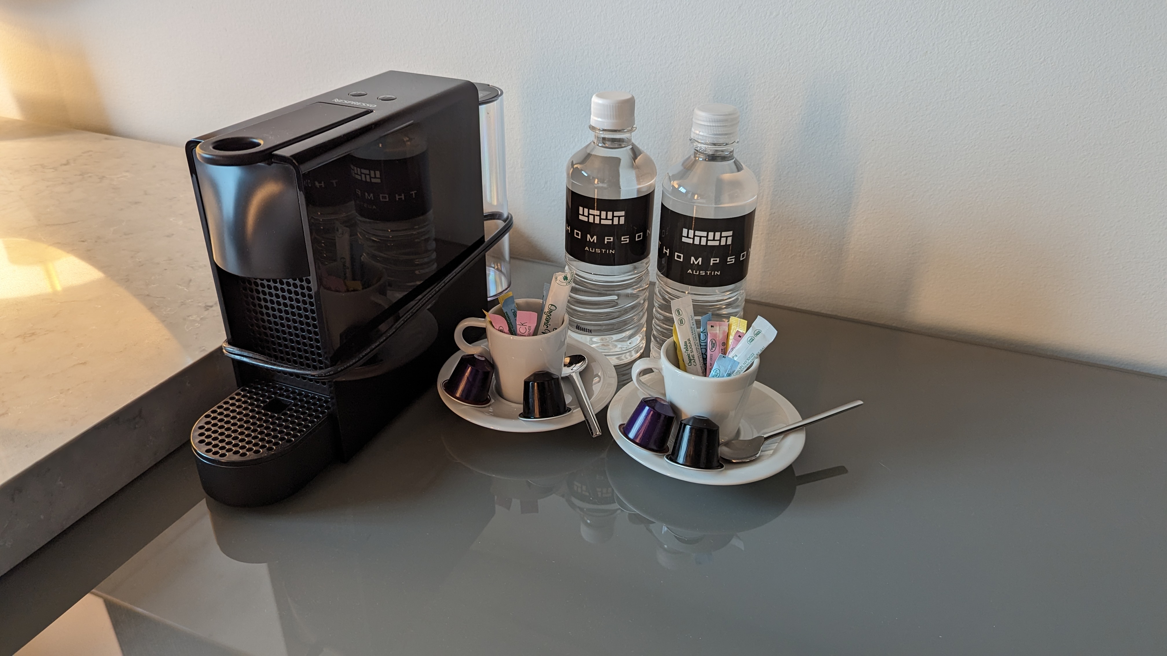 Thompson Austin room Nespresso coffee and water Thompson Austin room Nespresso coffee and water