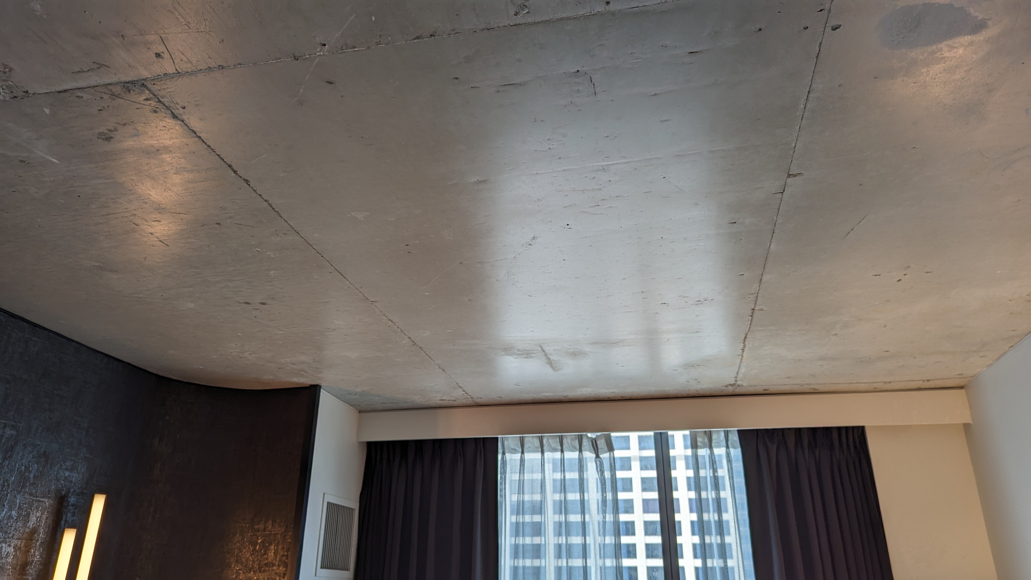 Thompson Austin room concrete ceiling Thompson Austin room concrete ceiling