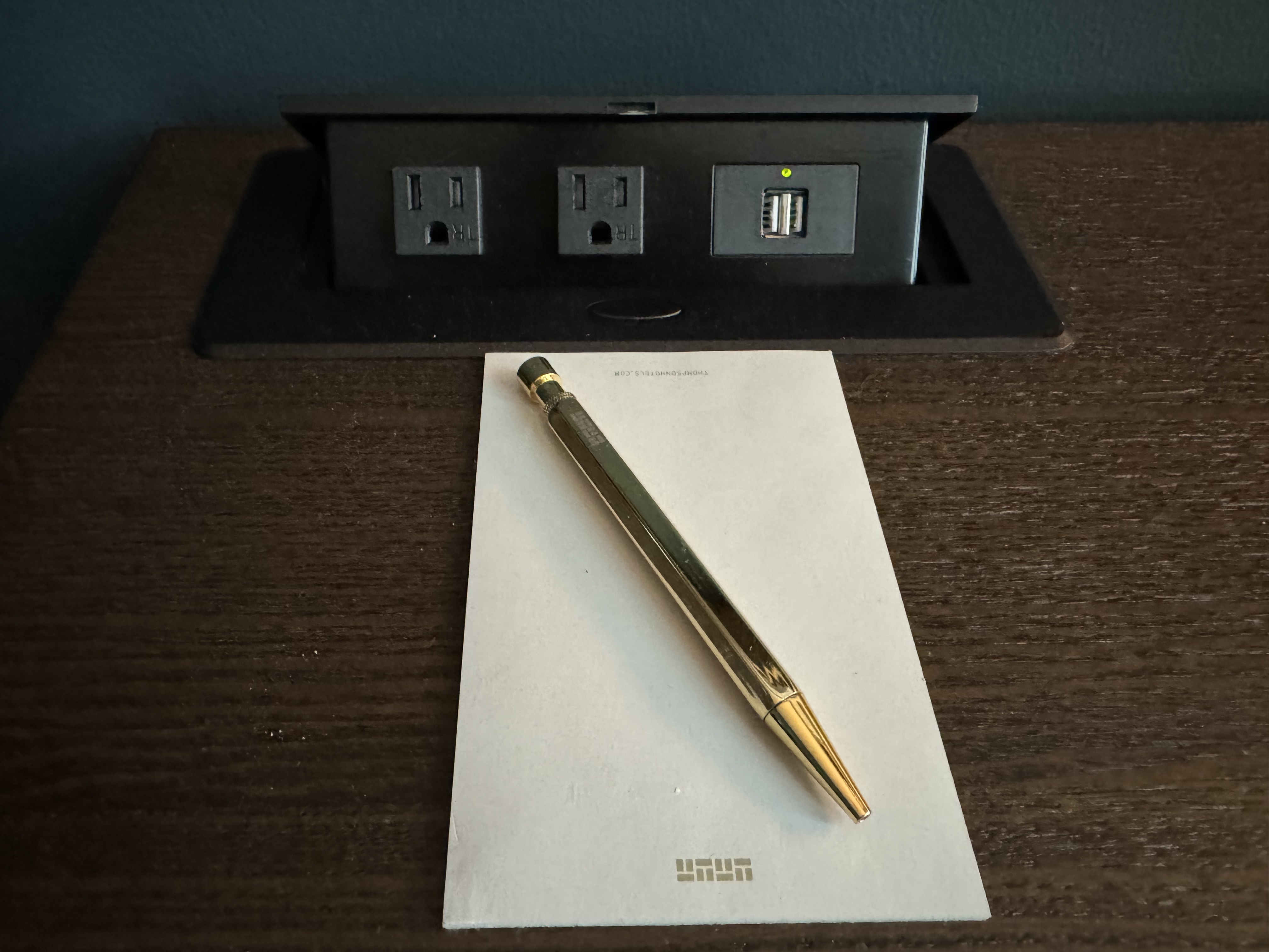Thompson San Antonio Riverwalk bedroom desk outlets and notepad Thompson San Antonio Riverwalk bedroom desk outlets and notepad