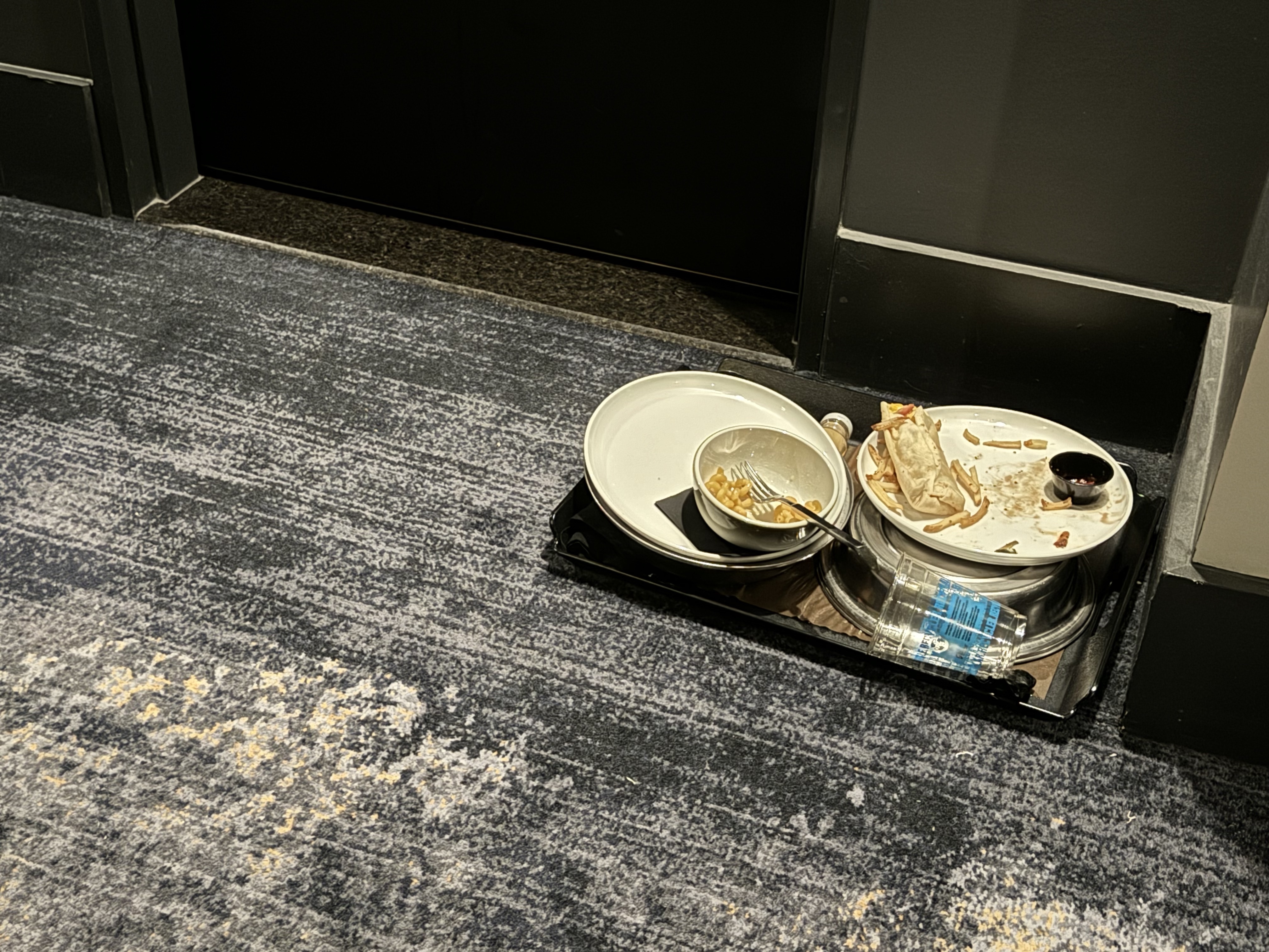 Thompson San Antonio Riverwalk dirty dishes in hallway Thompson San Antonio Riverwalk dirty dishes in hallway