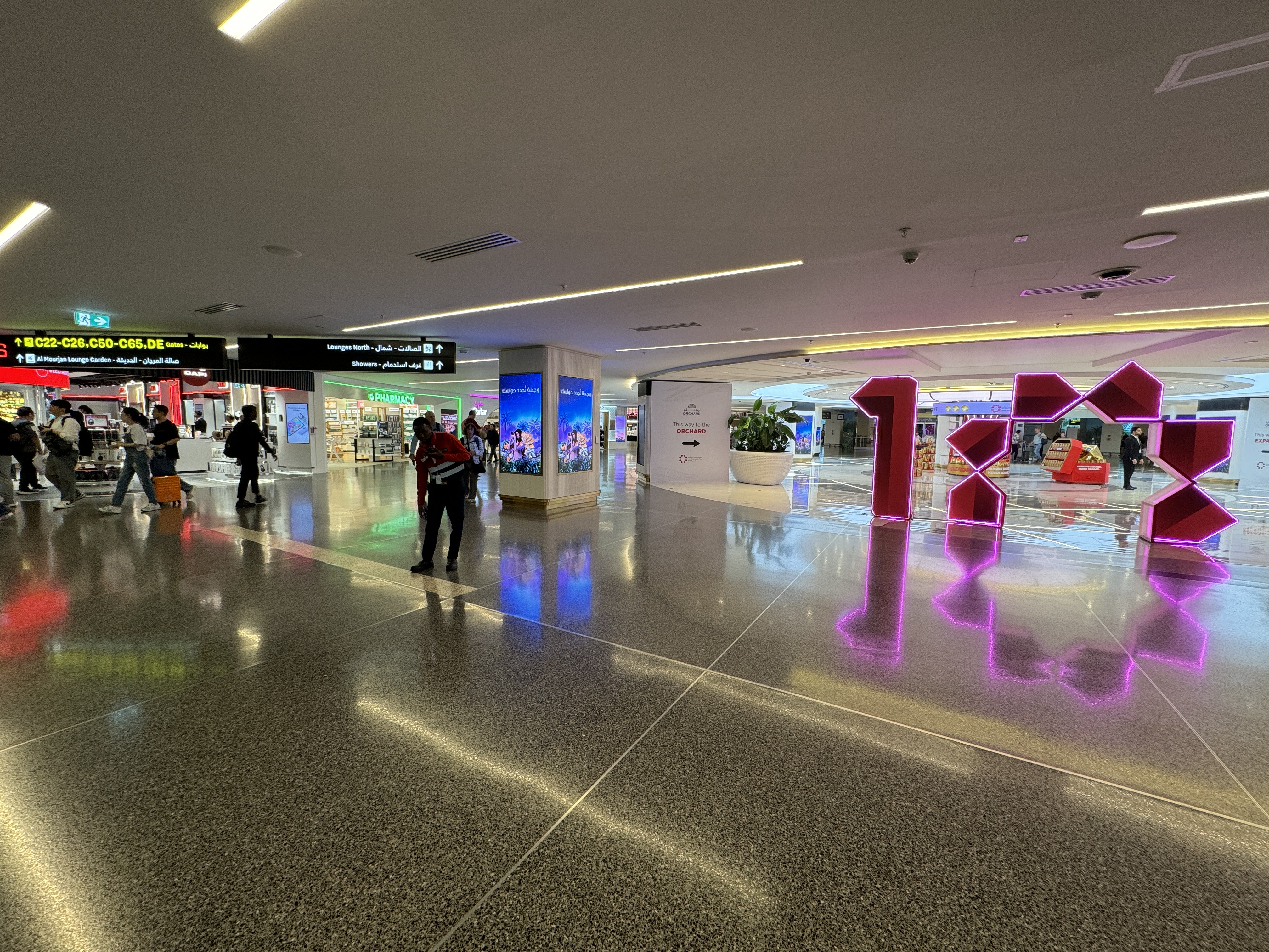 DOH path to Oryx Lounge North through Duty Free DOH path to Oryx Lounge North through Duty Free