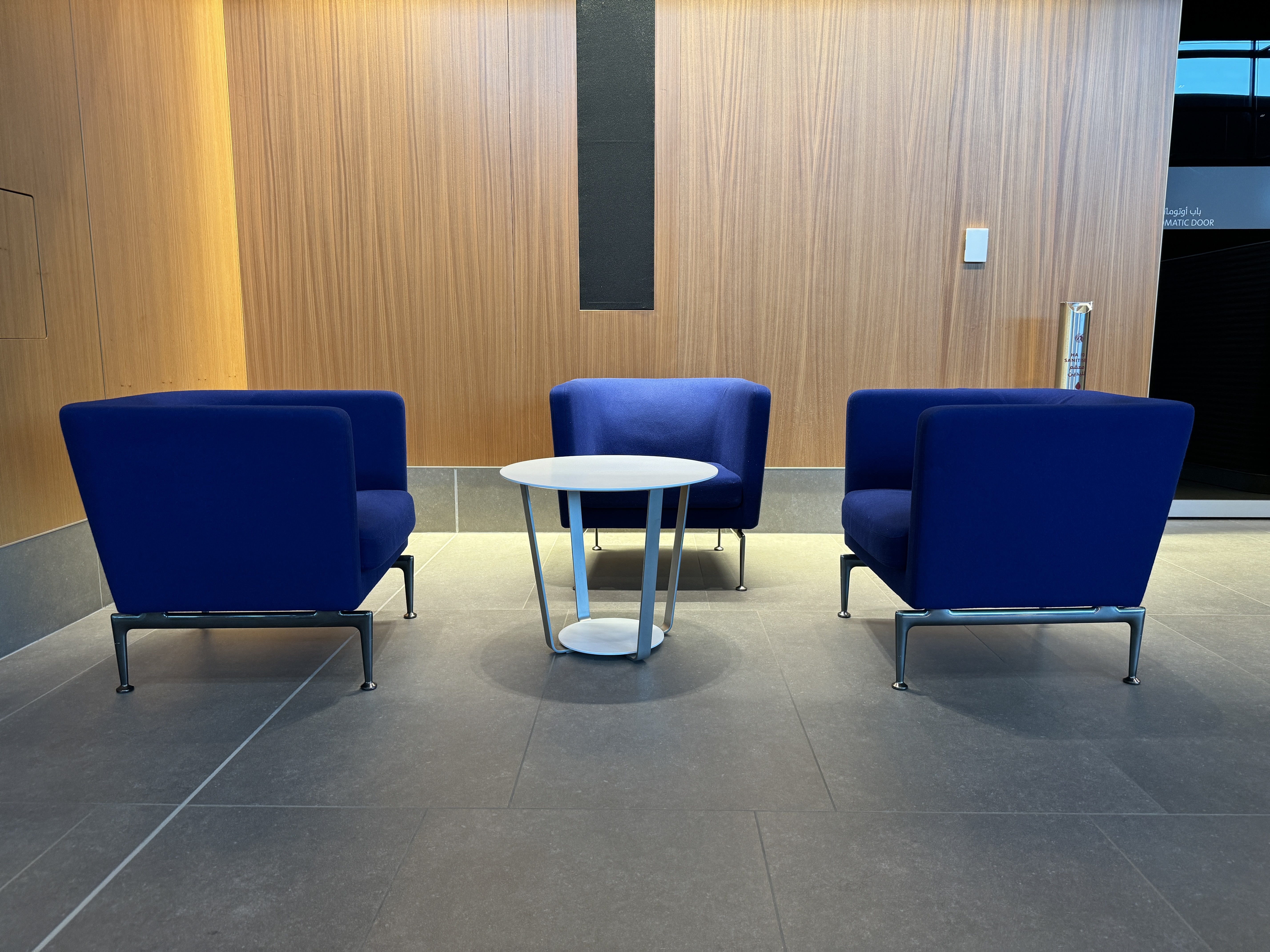 Oryx Lounge North DOH blue seats Oryx Lounge North DOH blue seats