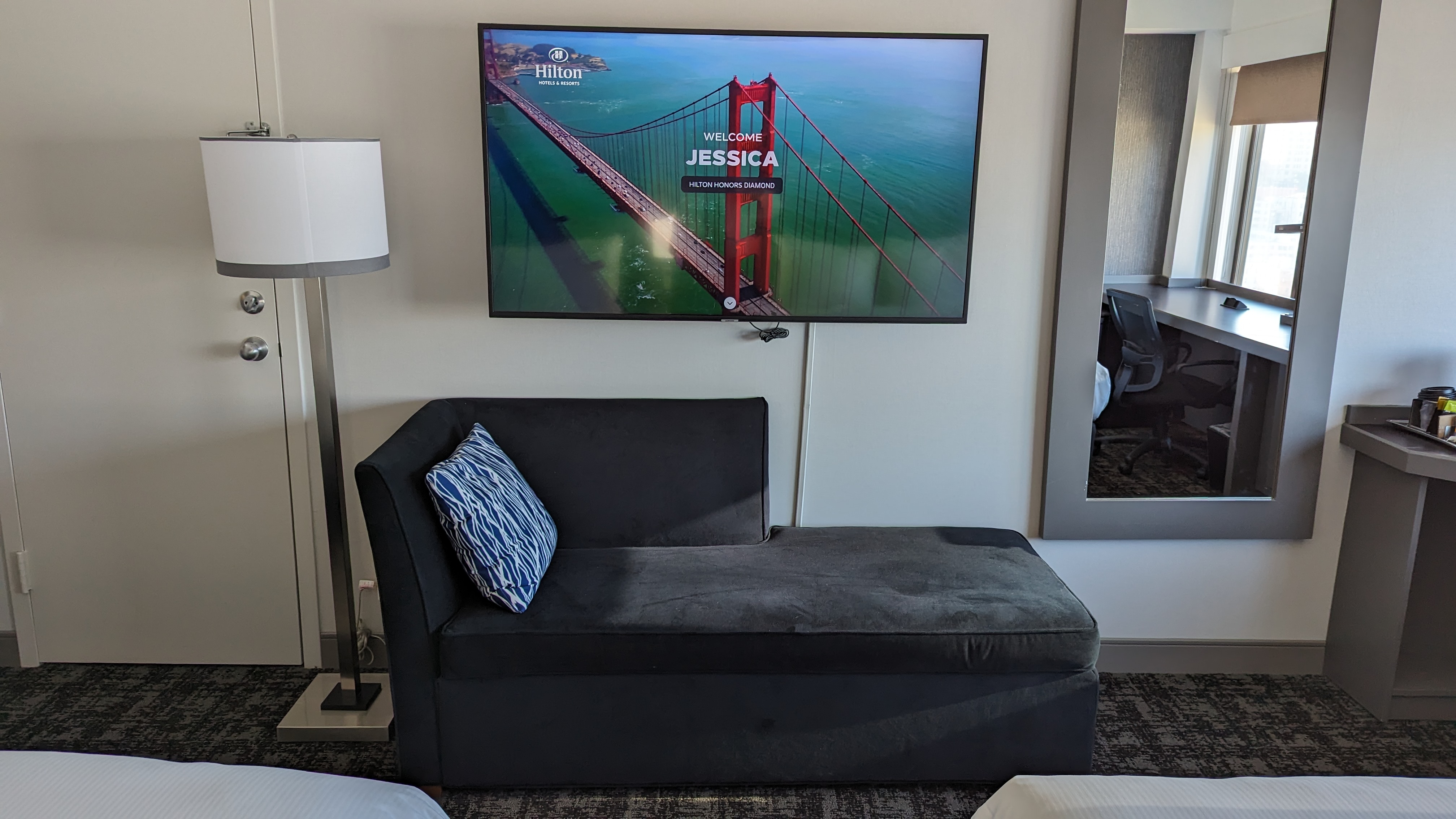 San Francisco Hilton Financial District guestroom TV mirror and lounger San Francisco Hilton Financial District guestroom TV mirror and lounger