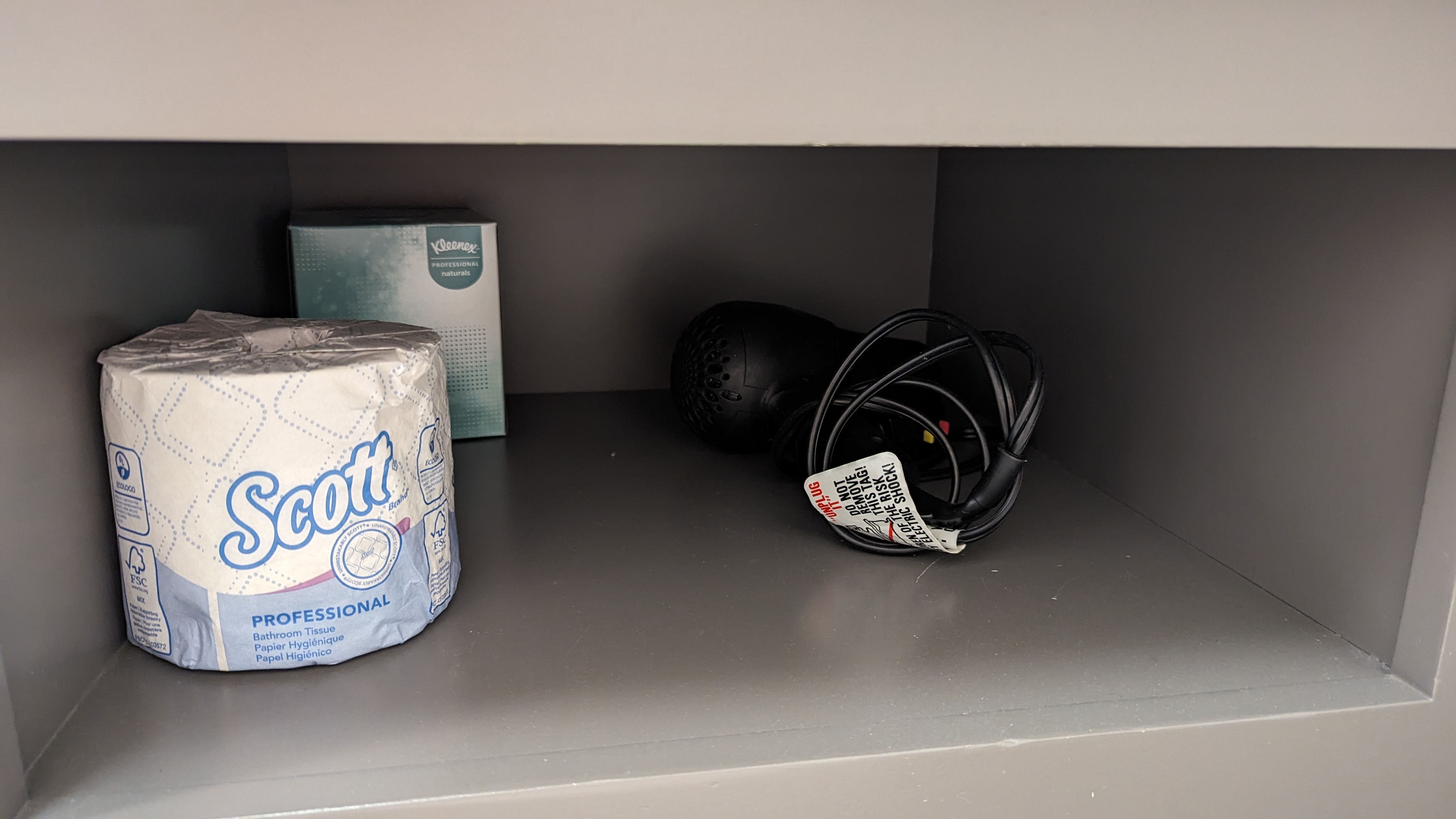 San Francisco Hilton Financial District guestroom bathrool toilet paper and hair dryer San Francisco Hilton Financial District guestroom bathrool toilet paper and hair dryer