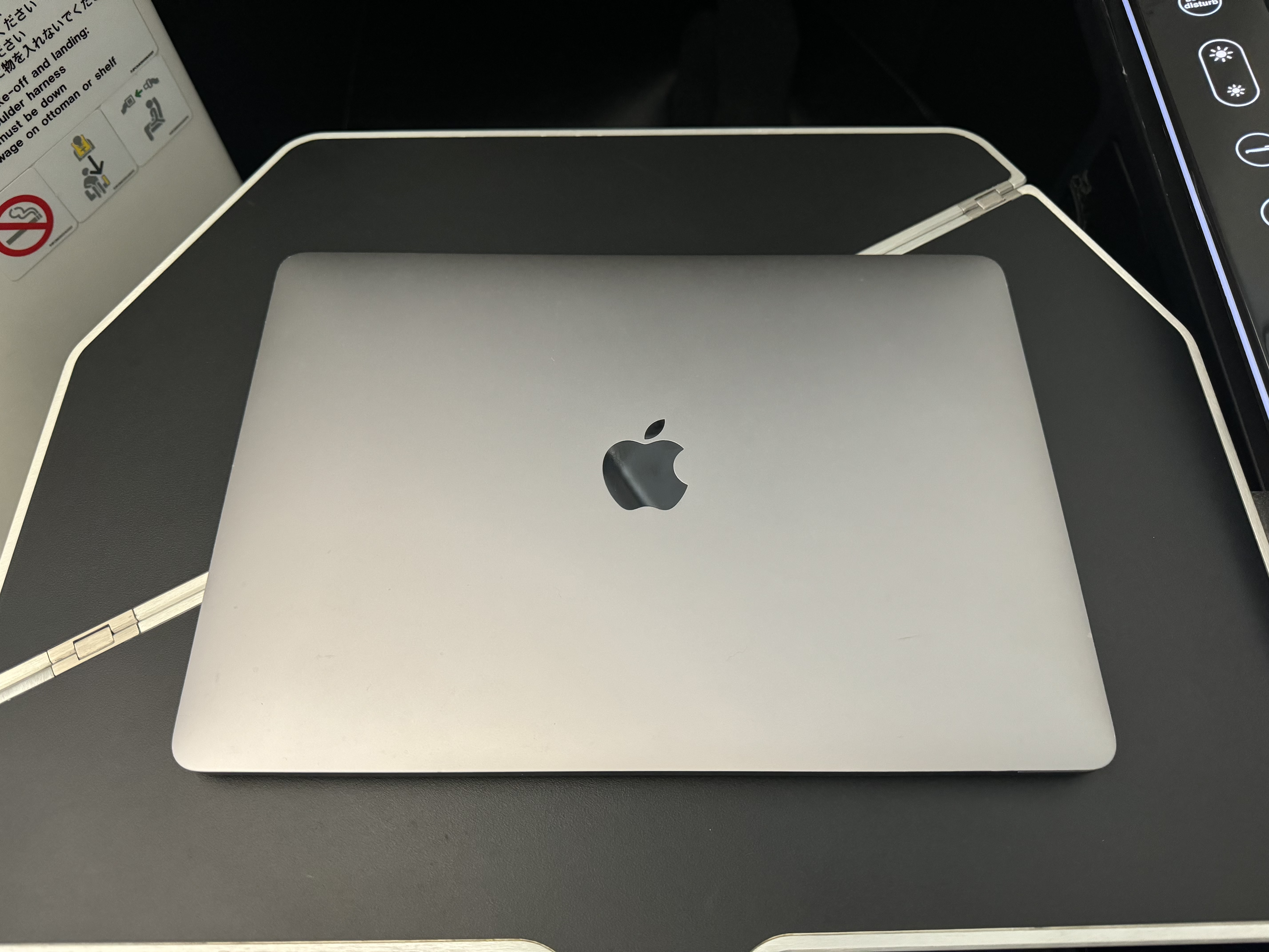 Zipair LAX NRT business class tray table with laptop Zipair LAX NRT business class tray table with laptop