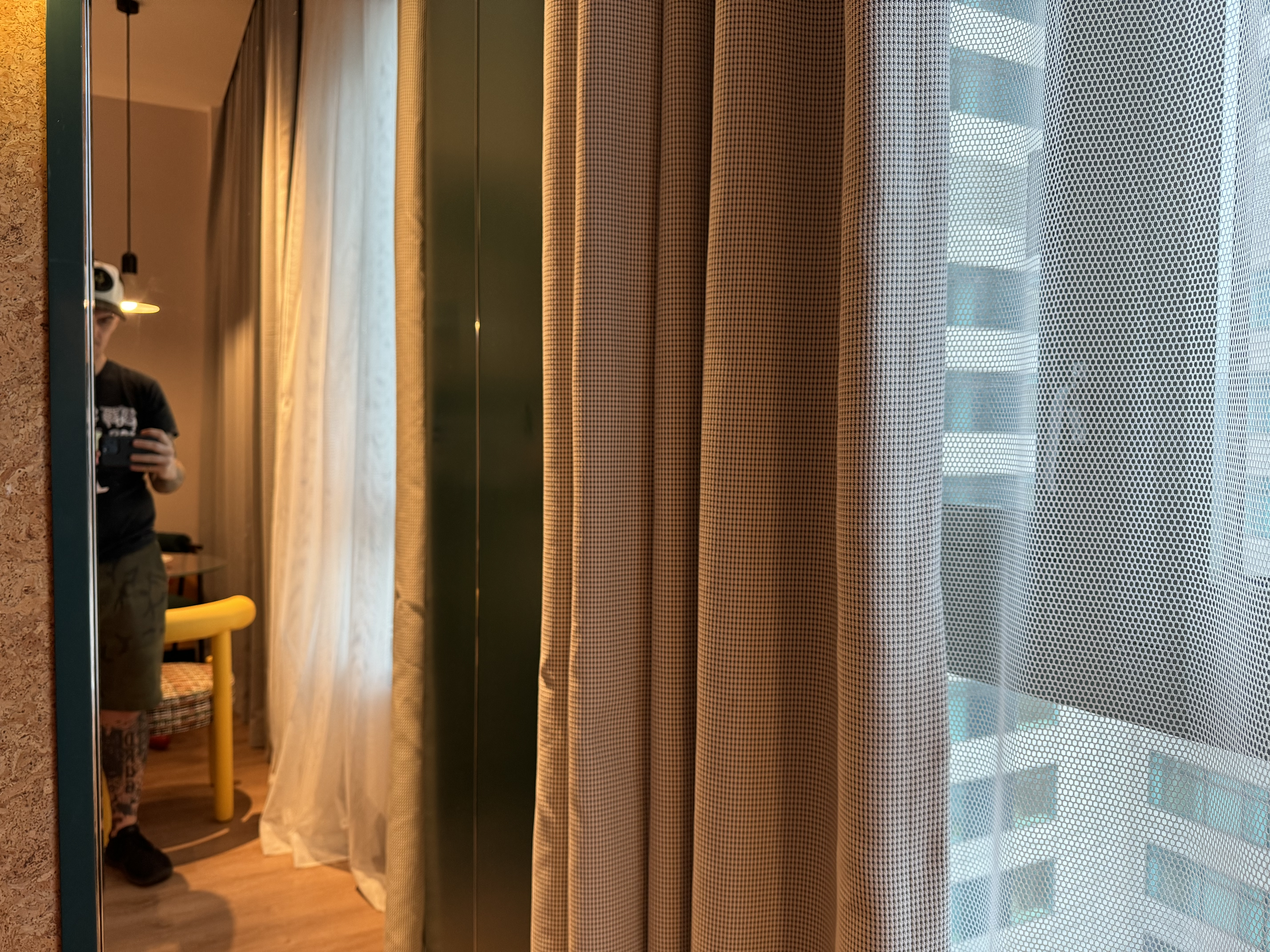Caption by Hyatt Zhongshan Park Shanghai bedroom mirror curtains