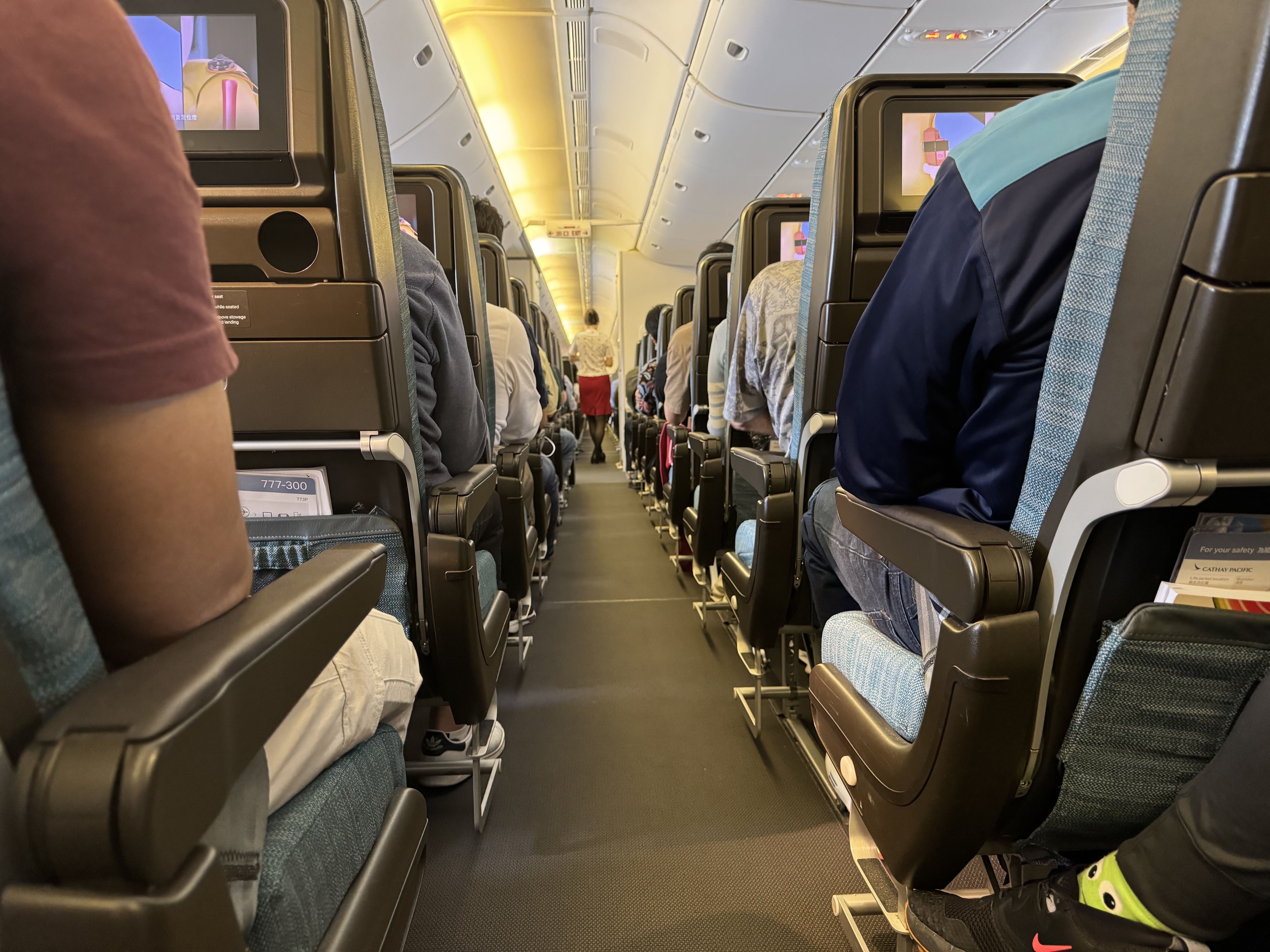 Cathay Pacific B777 300 economy aisle Cathay Pacific B777 300 economy aisle