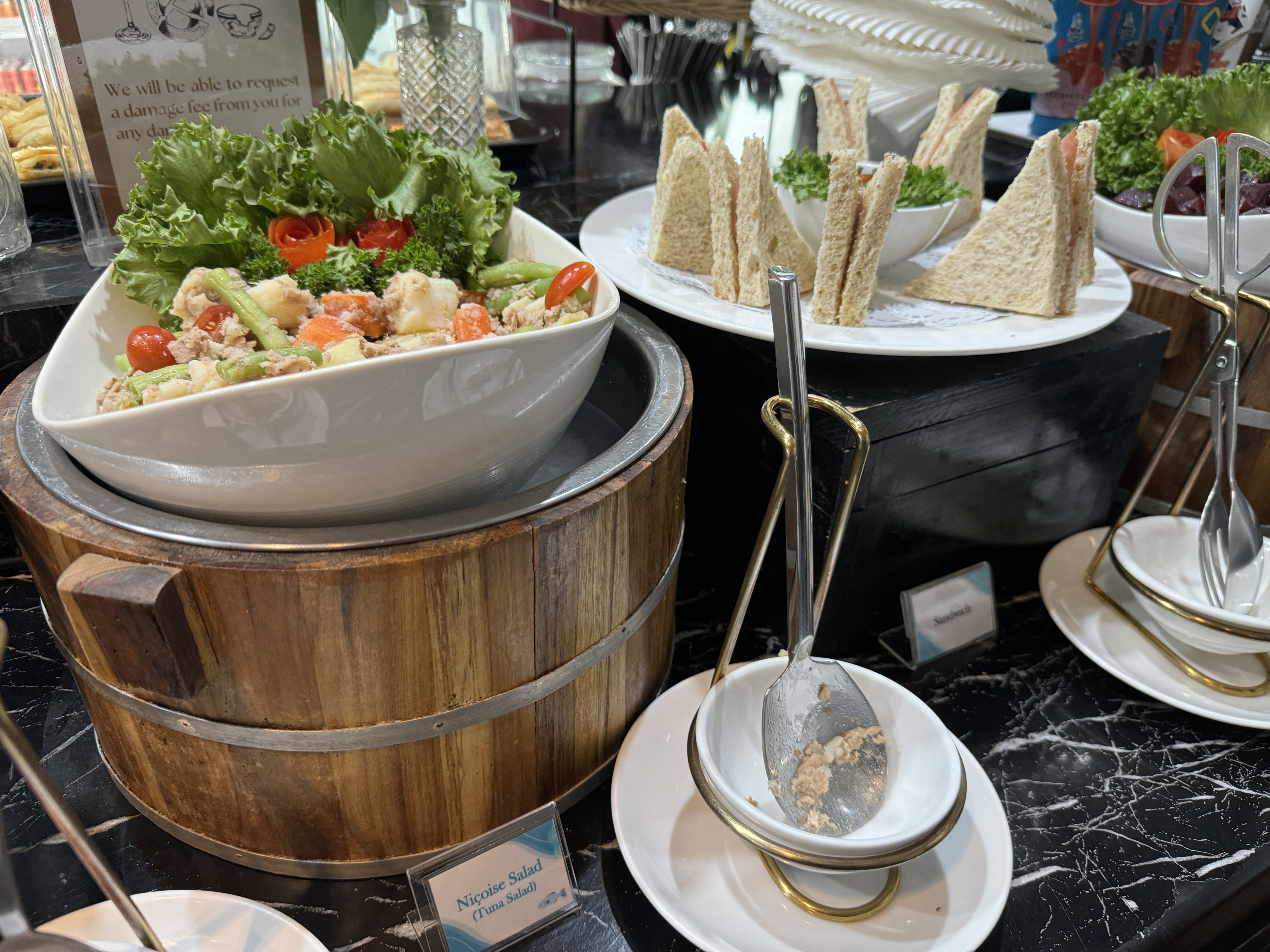 Coral Premium Departure Lounge HKT salad and sandwich Coral Premium Departure Lounge HKT salad and sandwich
