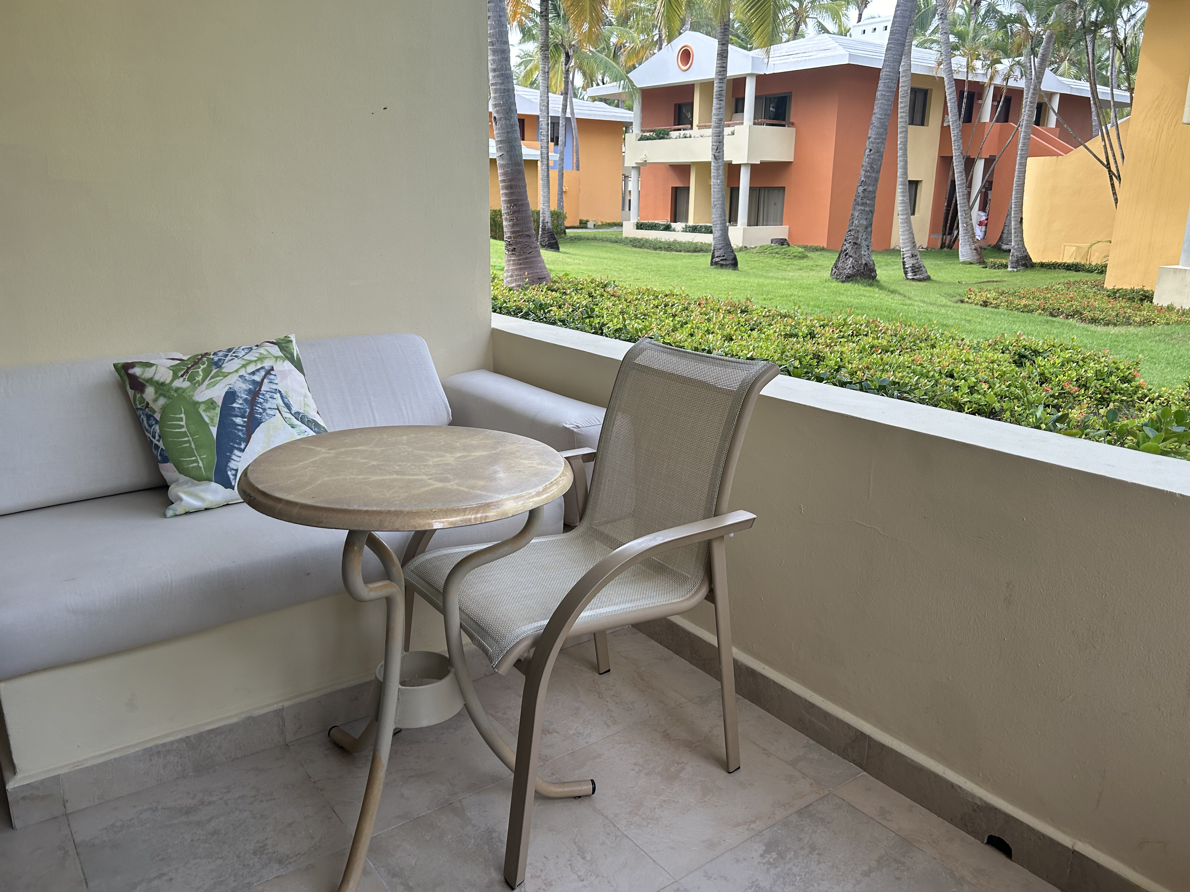 Iberostar Selection Bavaro Suites patio seating Iberostar Selection Bavaro Suites terrace chairs and table
