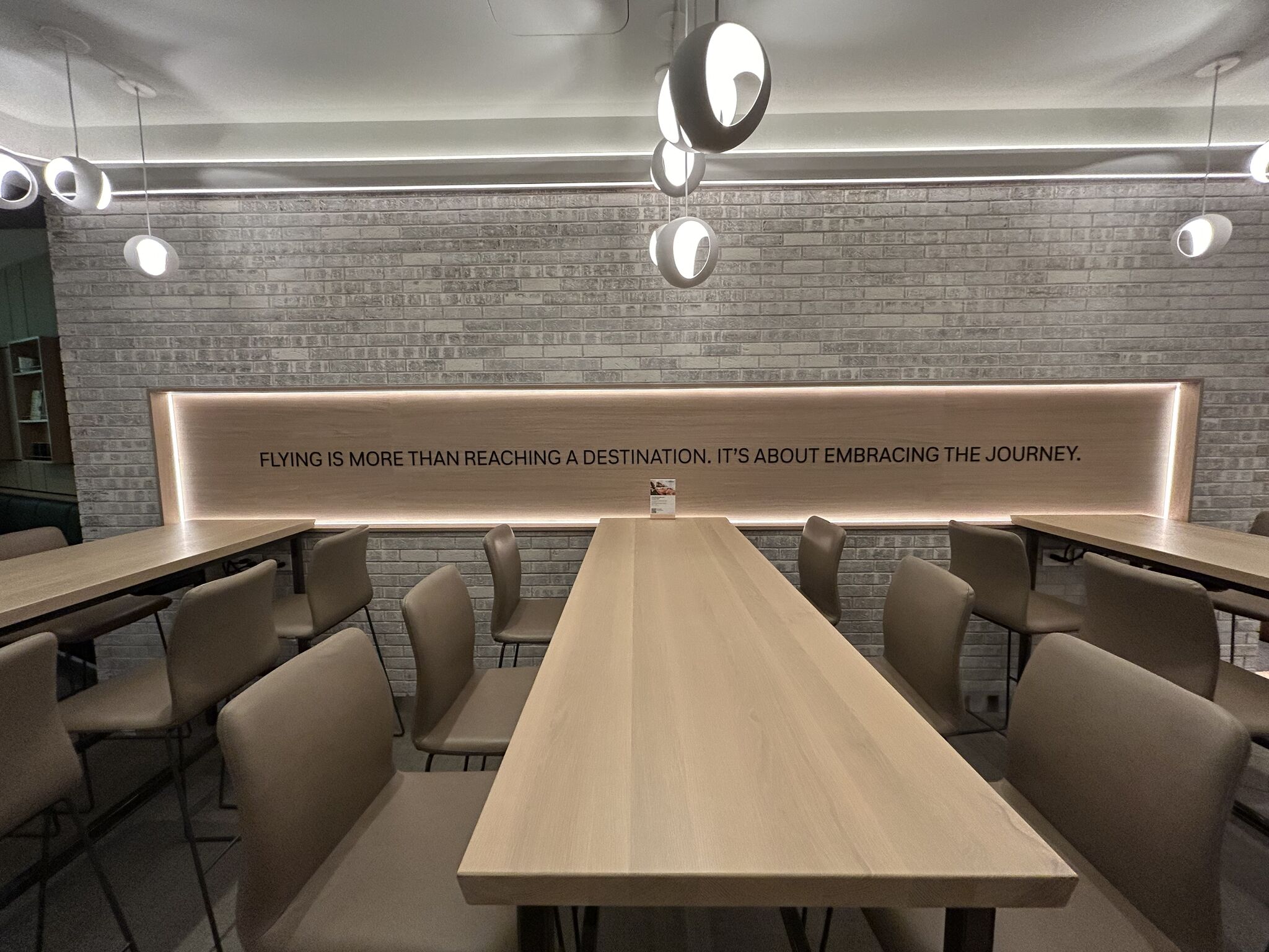 Lufthansa Allegris lounge Newark EWR long tables Lufthansa Allegris lounge Newark EWR long tables