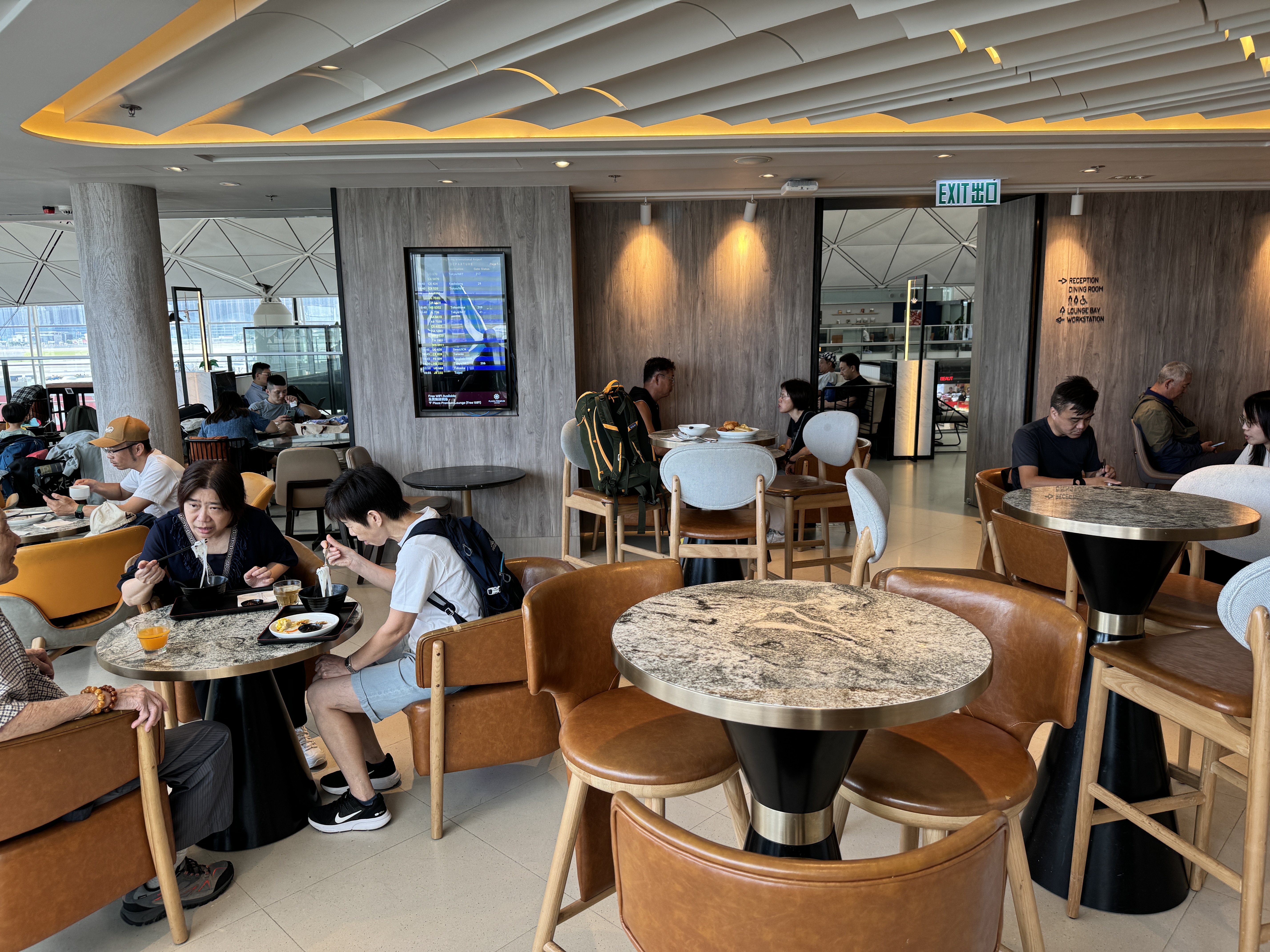 Plaza Premium Lounge HKG Gate 60 dining tables