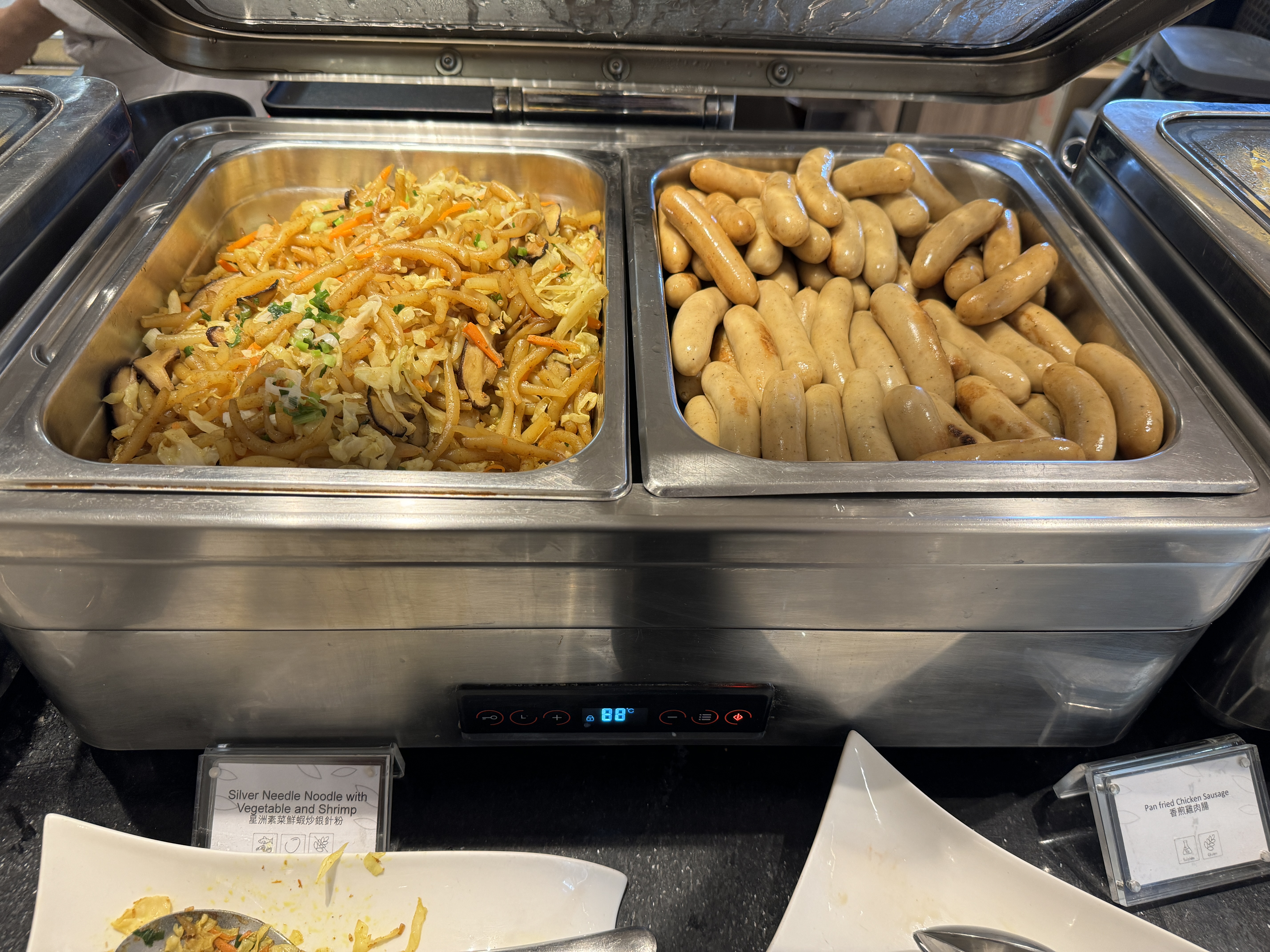Plaza Premium Lounge HKG Gate 60 noodles sausage