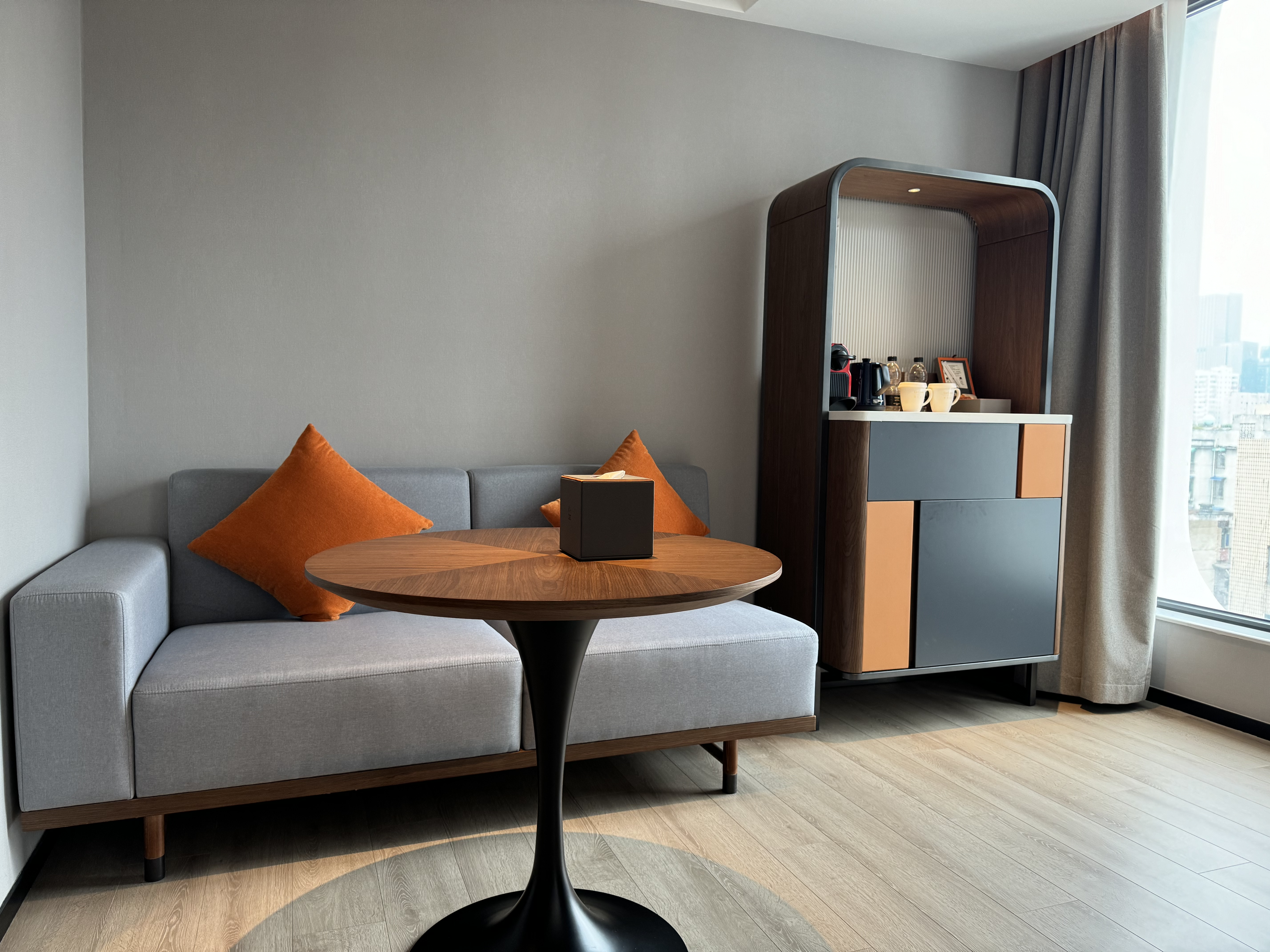 UrCove Chengdu Wenshu Monastery Taikoo Li bedroom seating area UrCove Chengdu Wenshu Monastery Taikoo Li bedroom seating area