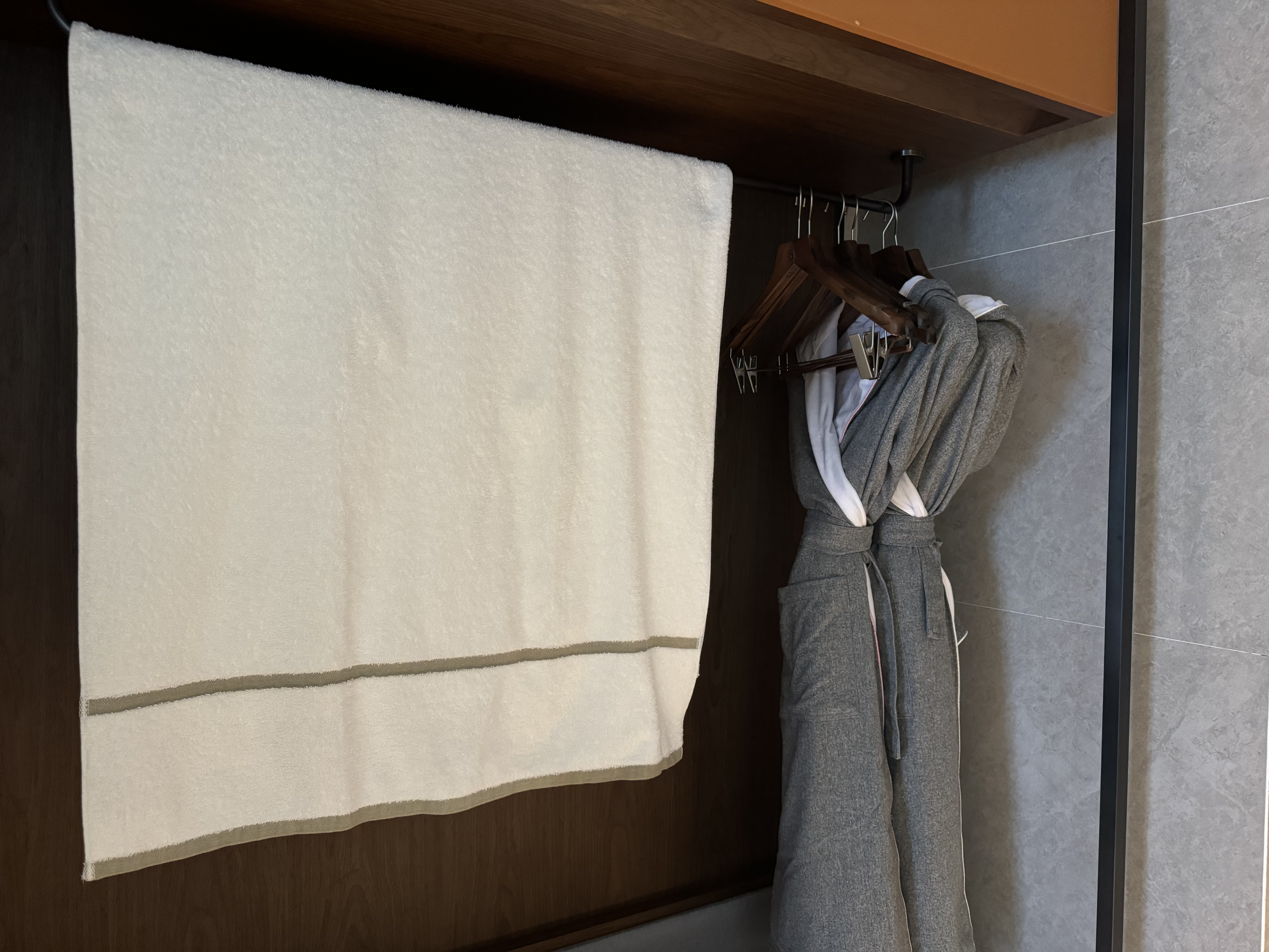 UrCove Chengdu Wenshu Monastery Taikoo Li closet with towel UrCove Chengdu Wenshu Monastery Taikoo Li closet with towel