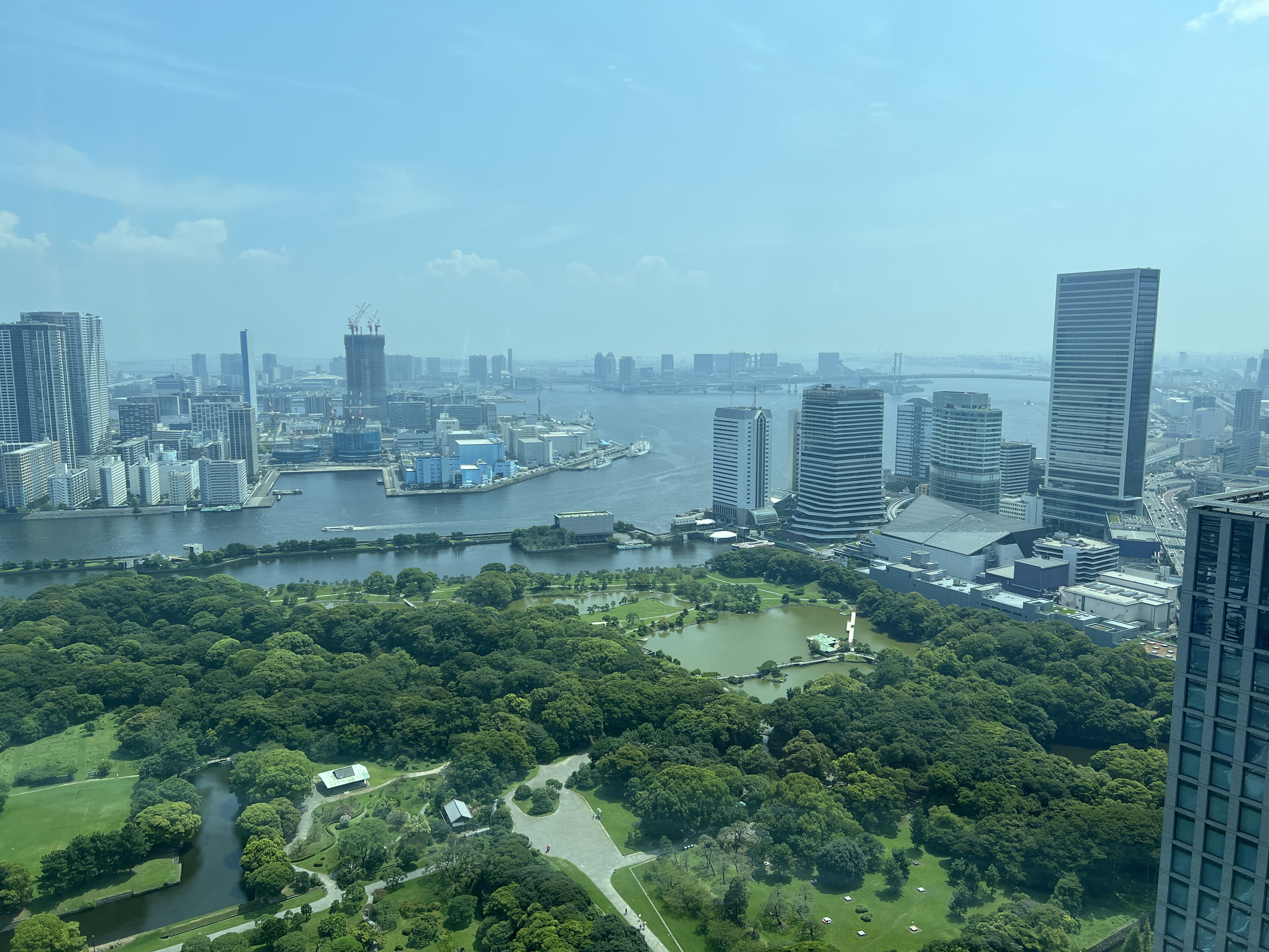 Conrad Tokyo view of gardens and Tokyo Bay Conrad Tokyo view of gardens and Tokyo Bay