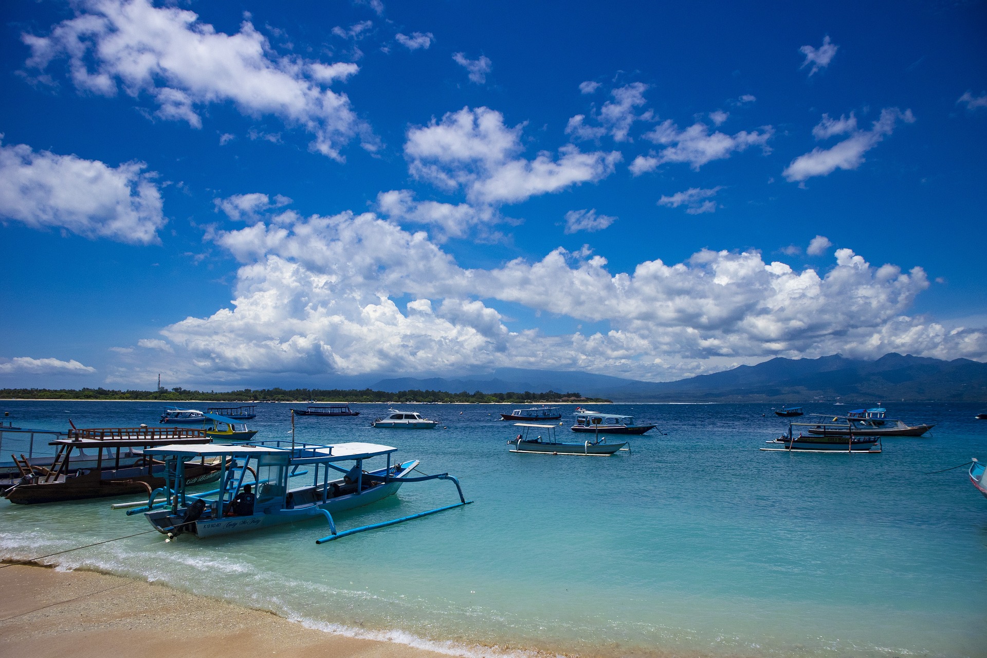 Indonesia Boats in blue water