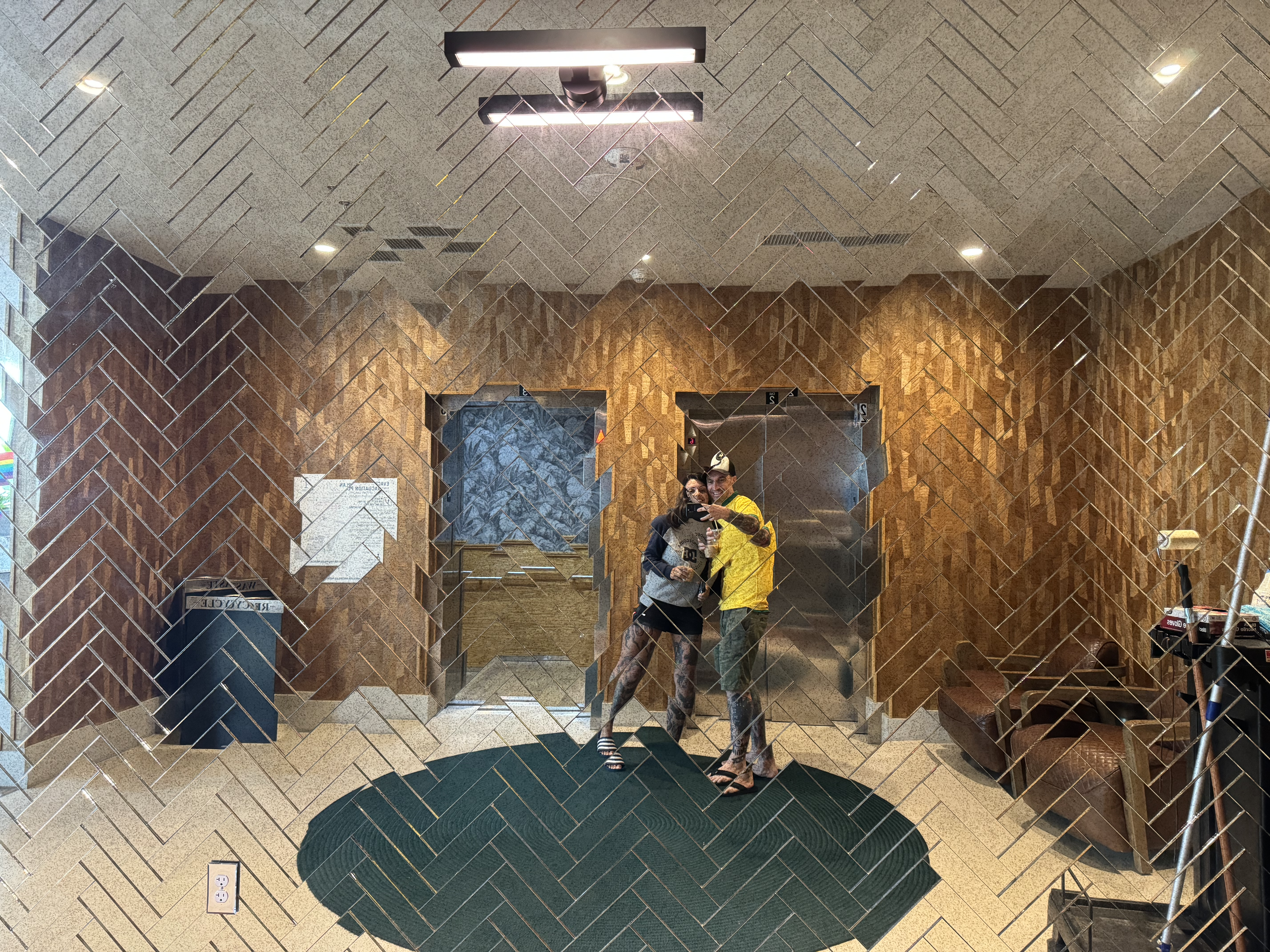 Kissel Uptown Oakland elevator mirrored wall