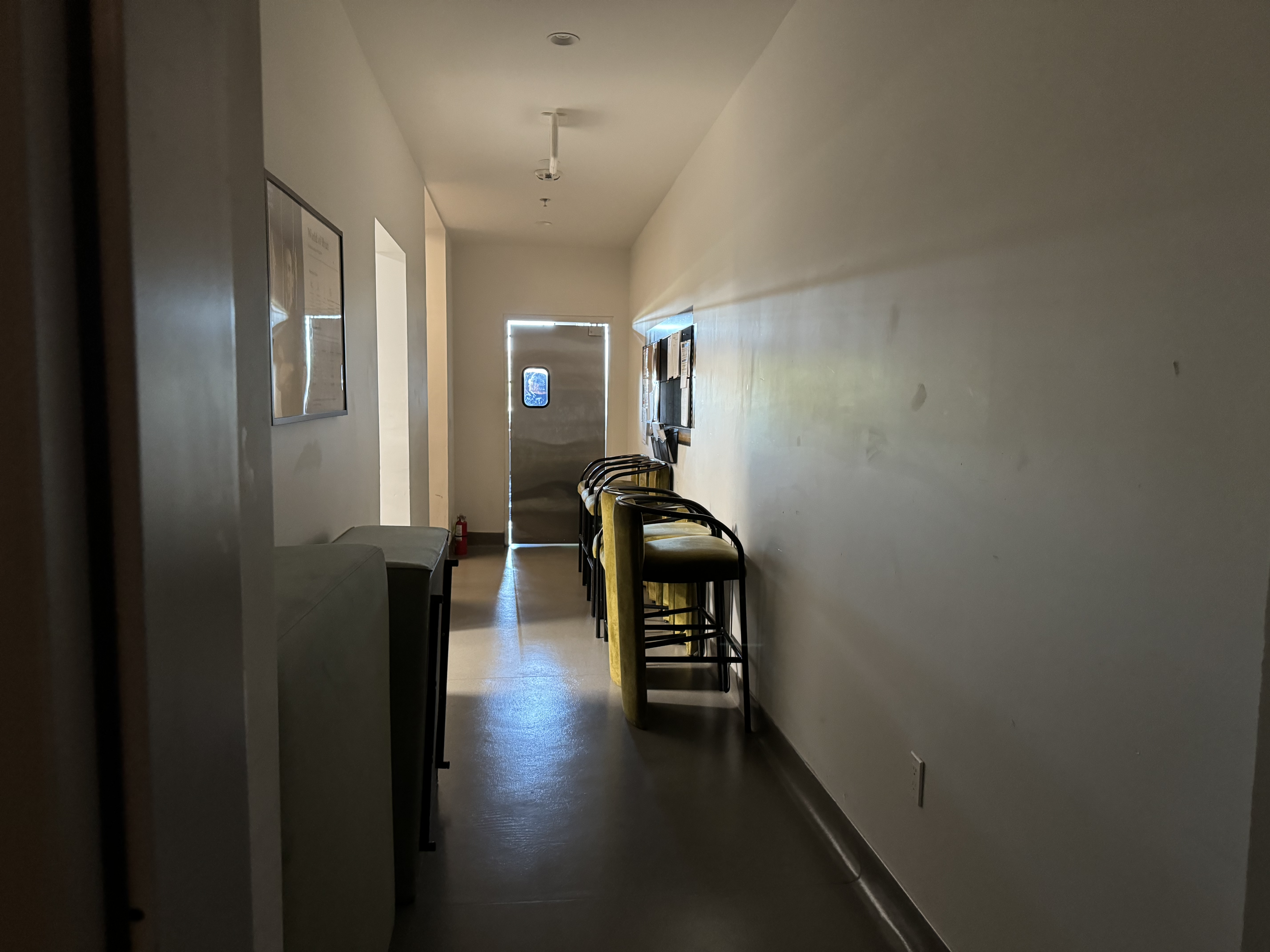 Kissel Uptown Oakland hallway to bar