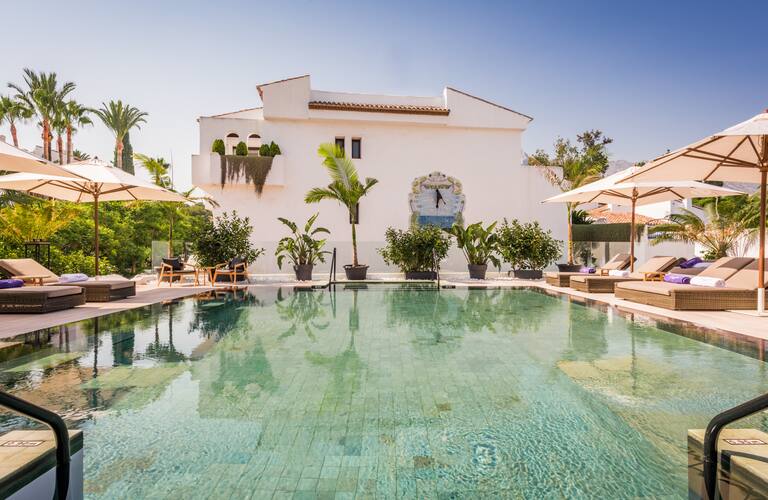 Nobu Marbella swimming pool palm trees