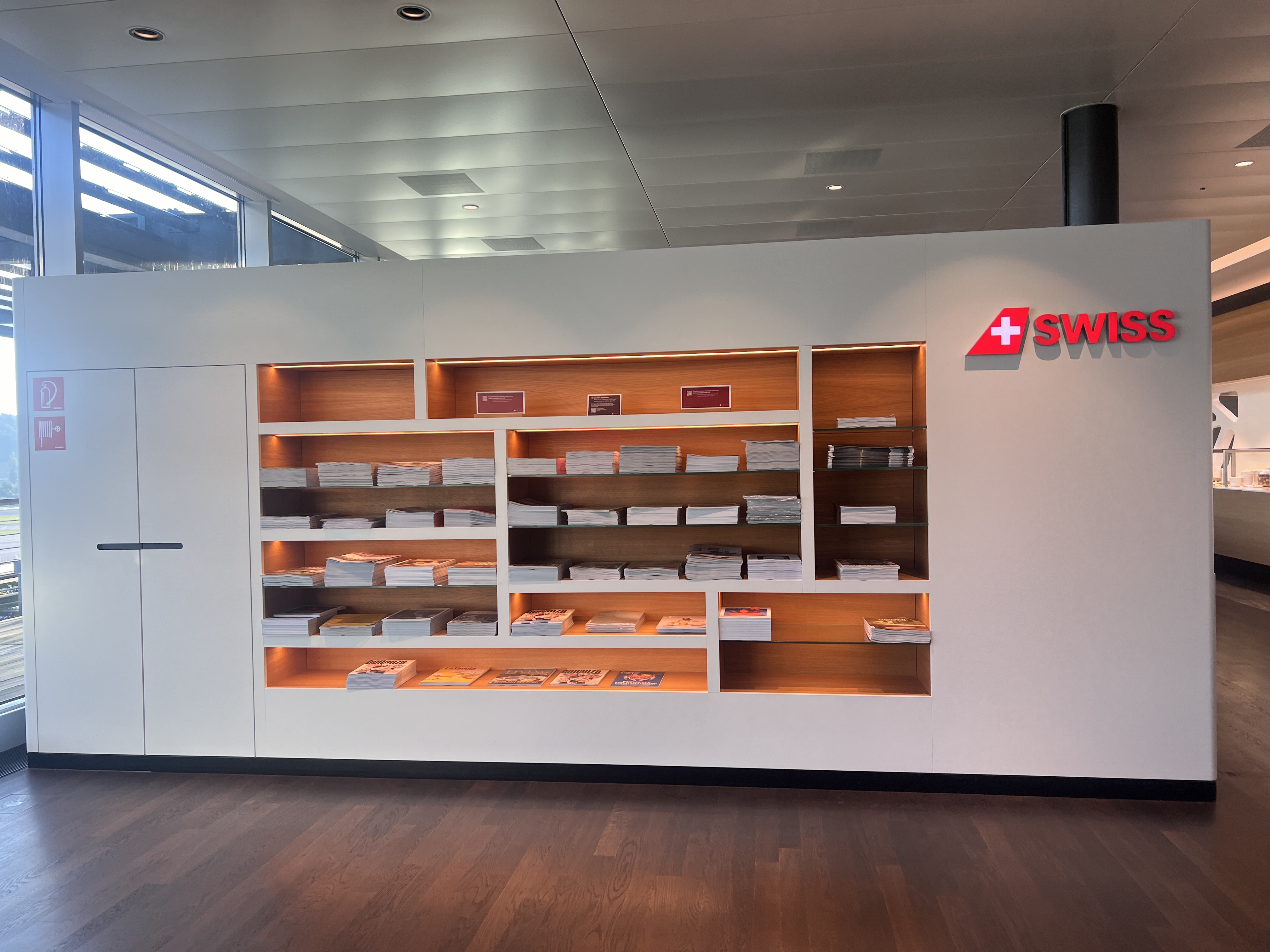 Swiss Business Class Lounge Zurich literature wall Swiss Business Class Lounge Zurich literature wall