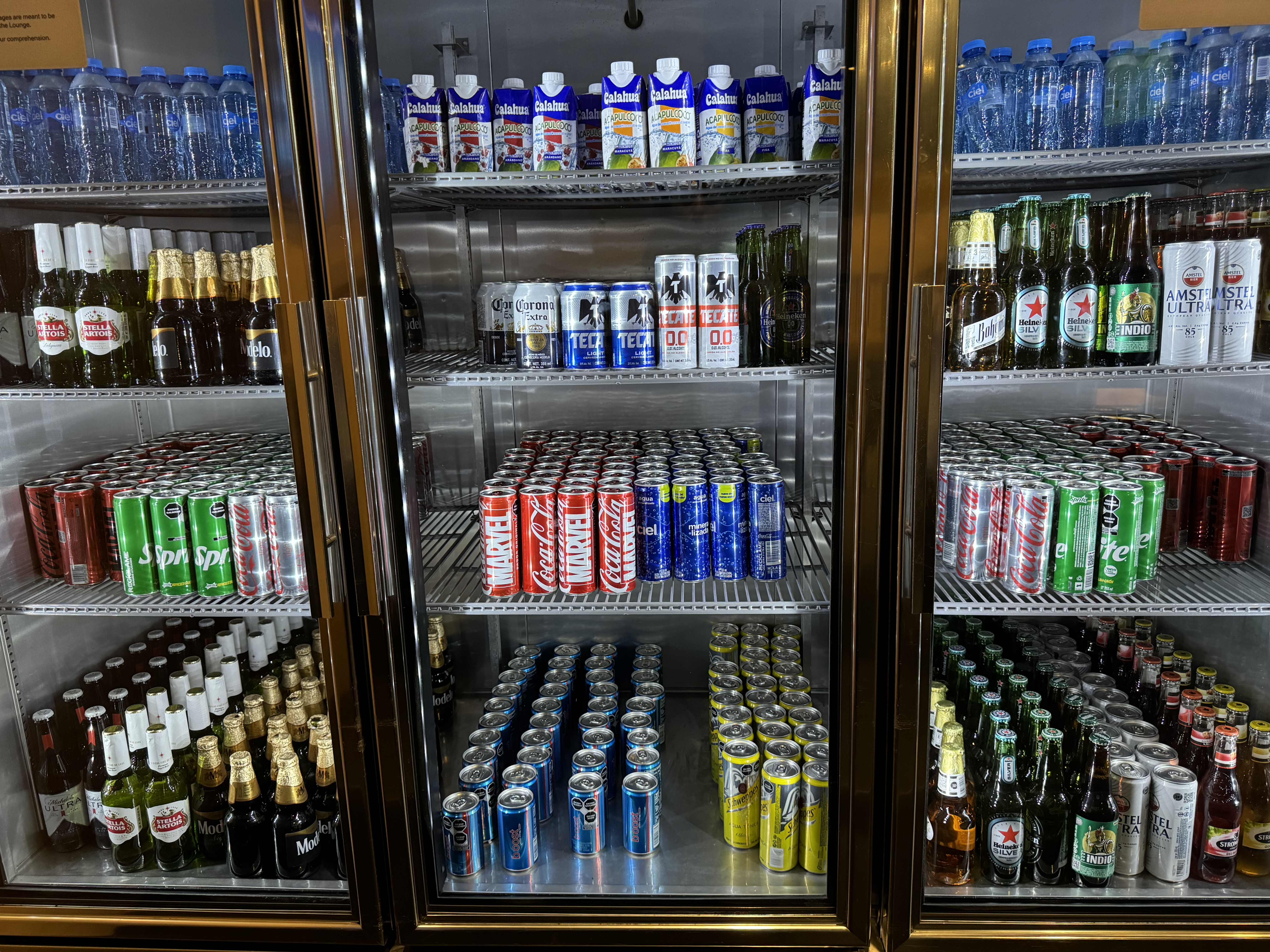 Aeromexico Salon Premier lounge MEX canned drinks Aeromexico Salon Premier lounge MEX cooler