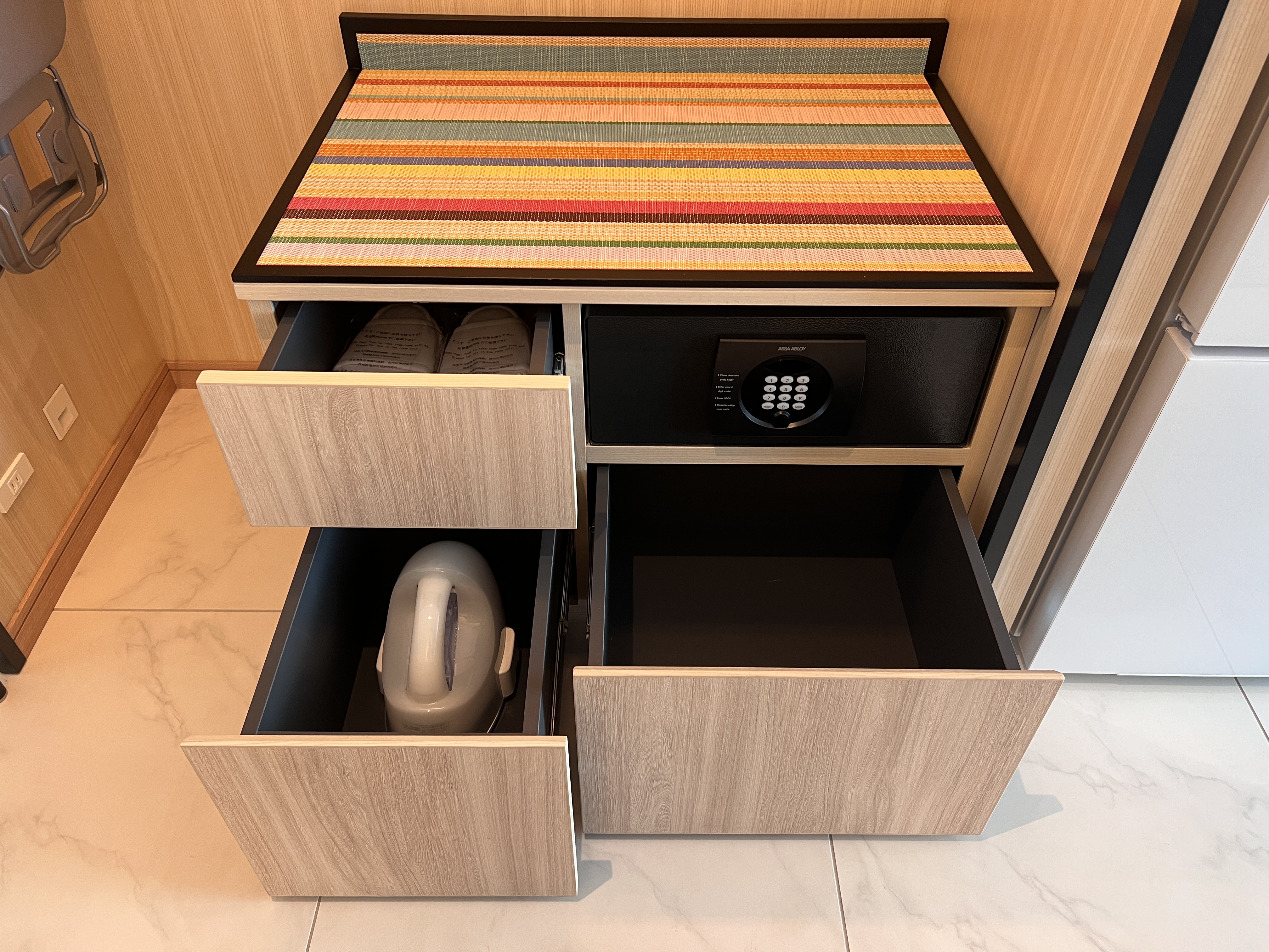 Hyatt House Tokyo Shibuya guest room integrated storage in closet Hyatt House Tokyo Shibuya guest room integrated storage in closet