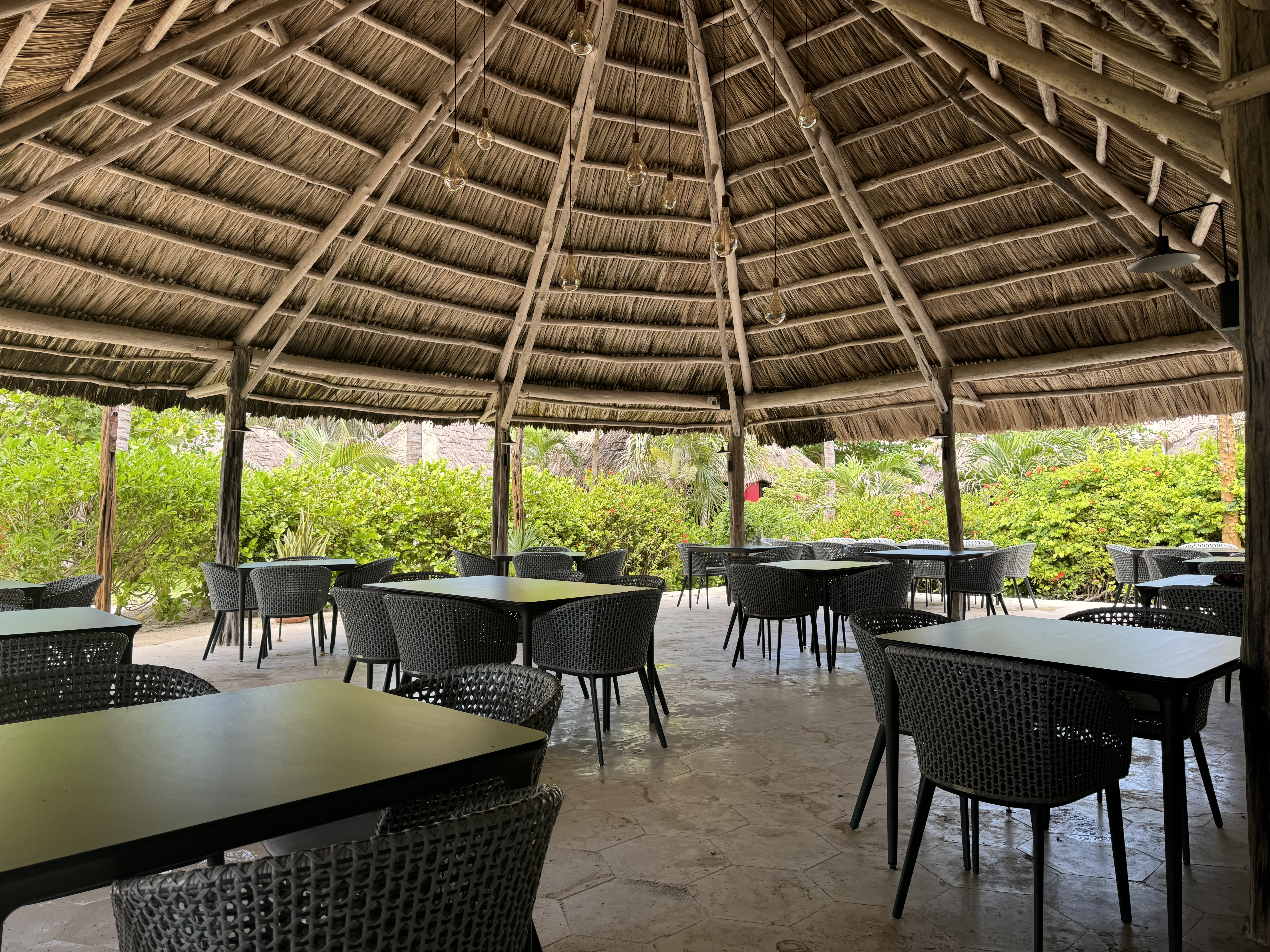 Matachica Resort Belize Mr Mrs Smith Mambo restaurant seating Matachica Resort Belize Mr Mrs Smith Mambo restaurant seating