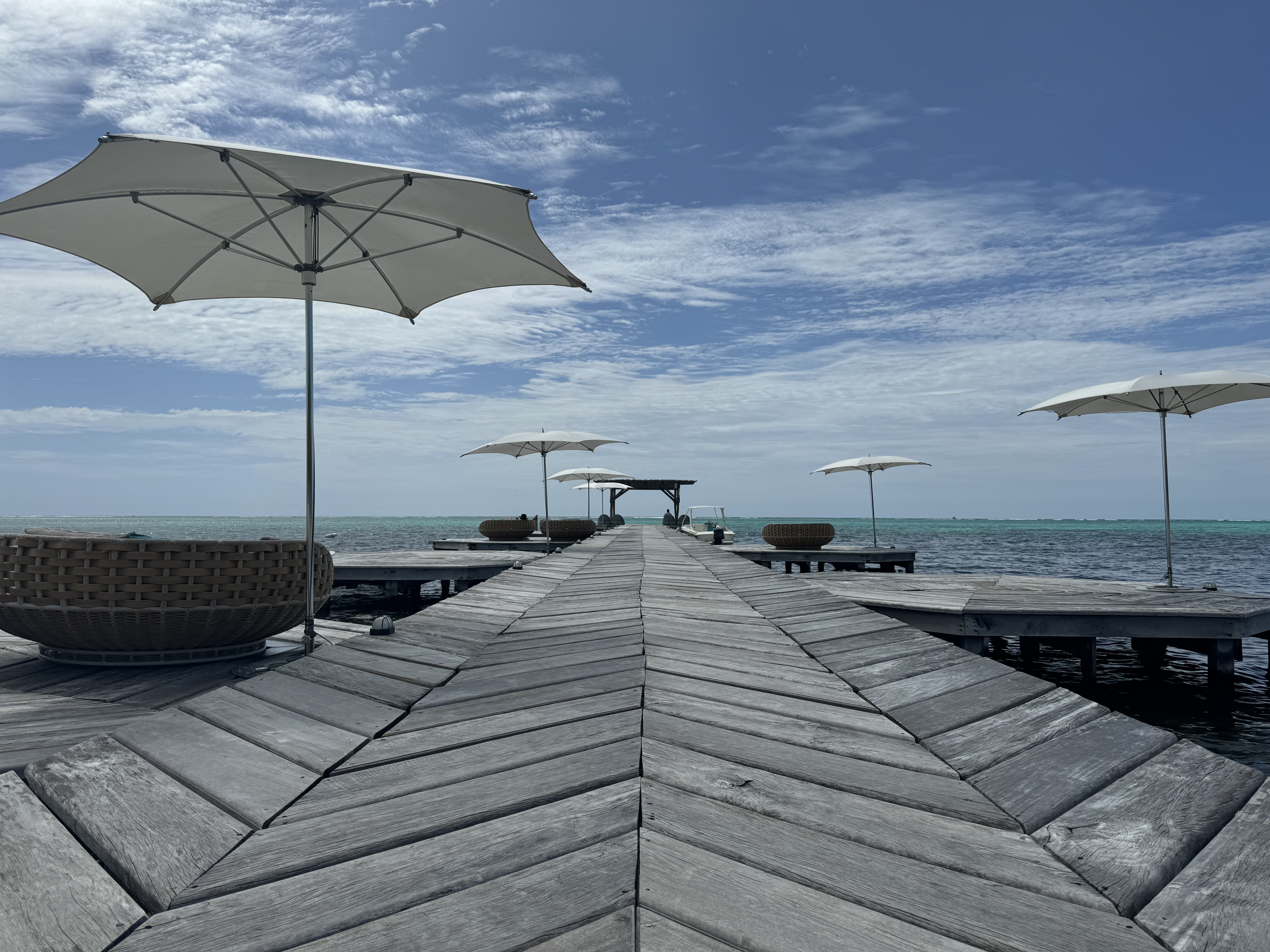 Matachica Resort Belize Mr Mrs Smith beach walkway Matachica Resort Belize Mr Mrs Smith beach walkway